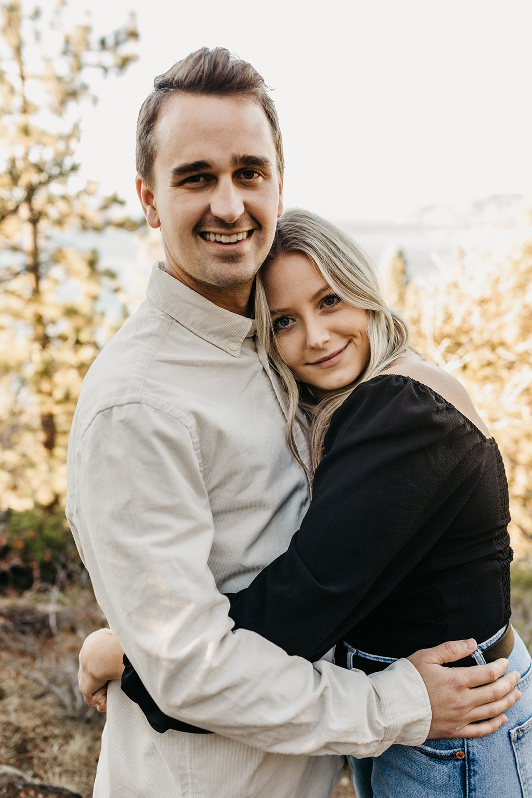 couple embraces in lake tahoe