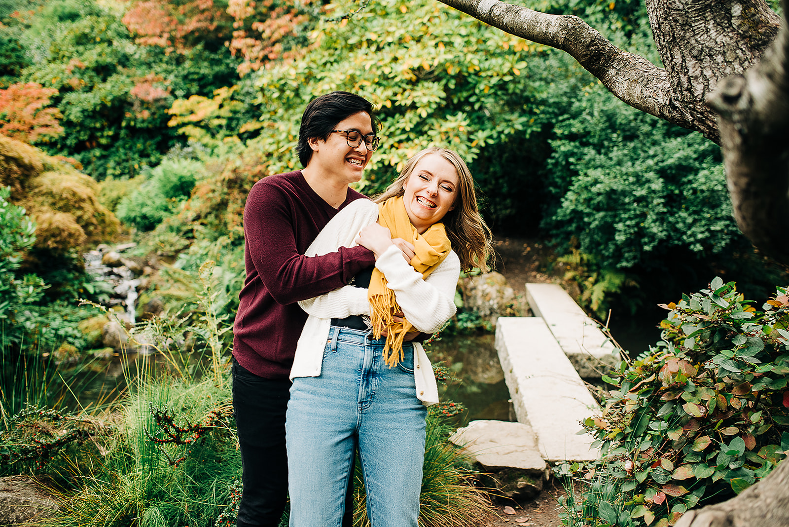 couple photographed at an engagement session at Kubota garden in Seattle