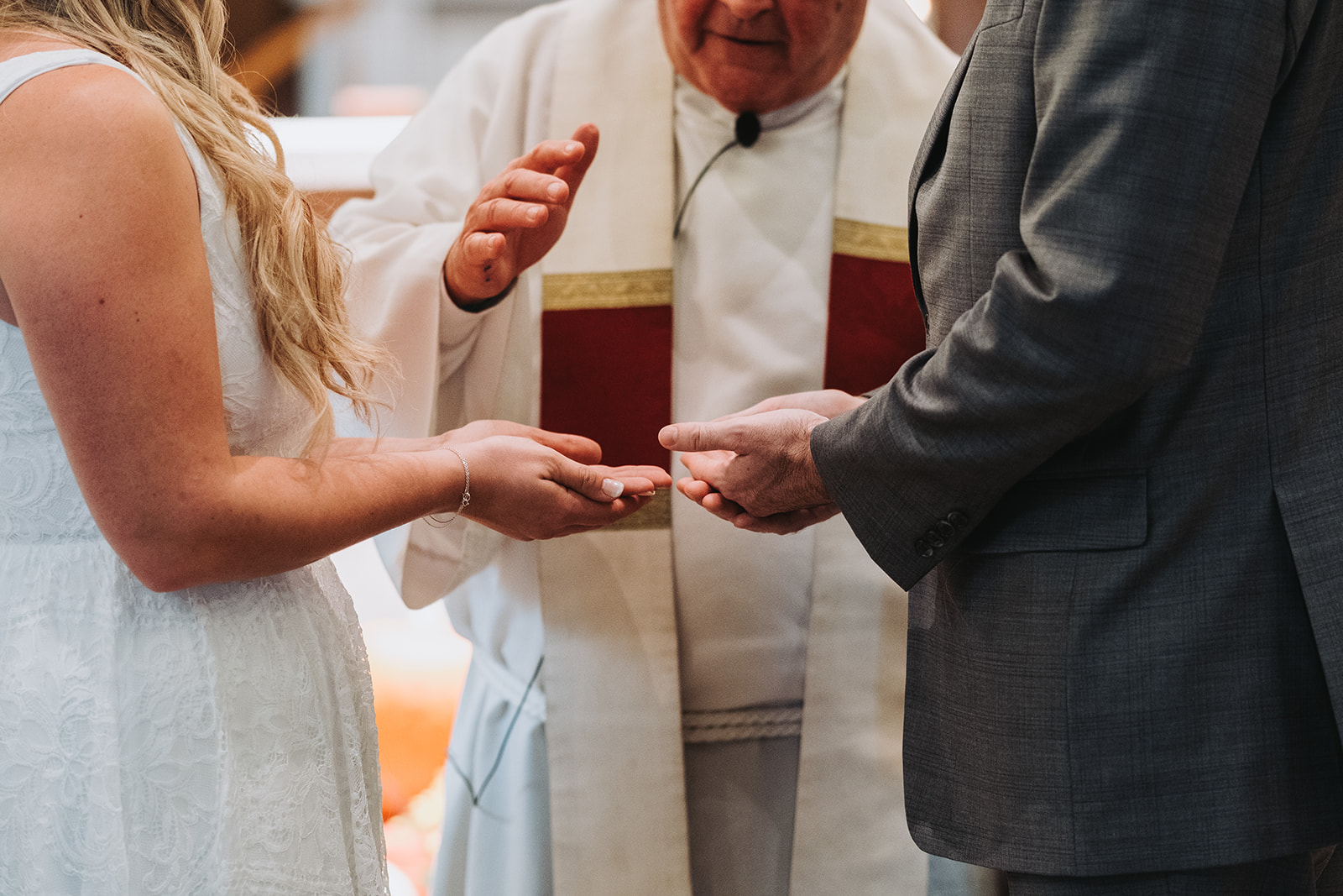 Blessing the wedding rings at the alter. 