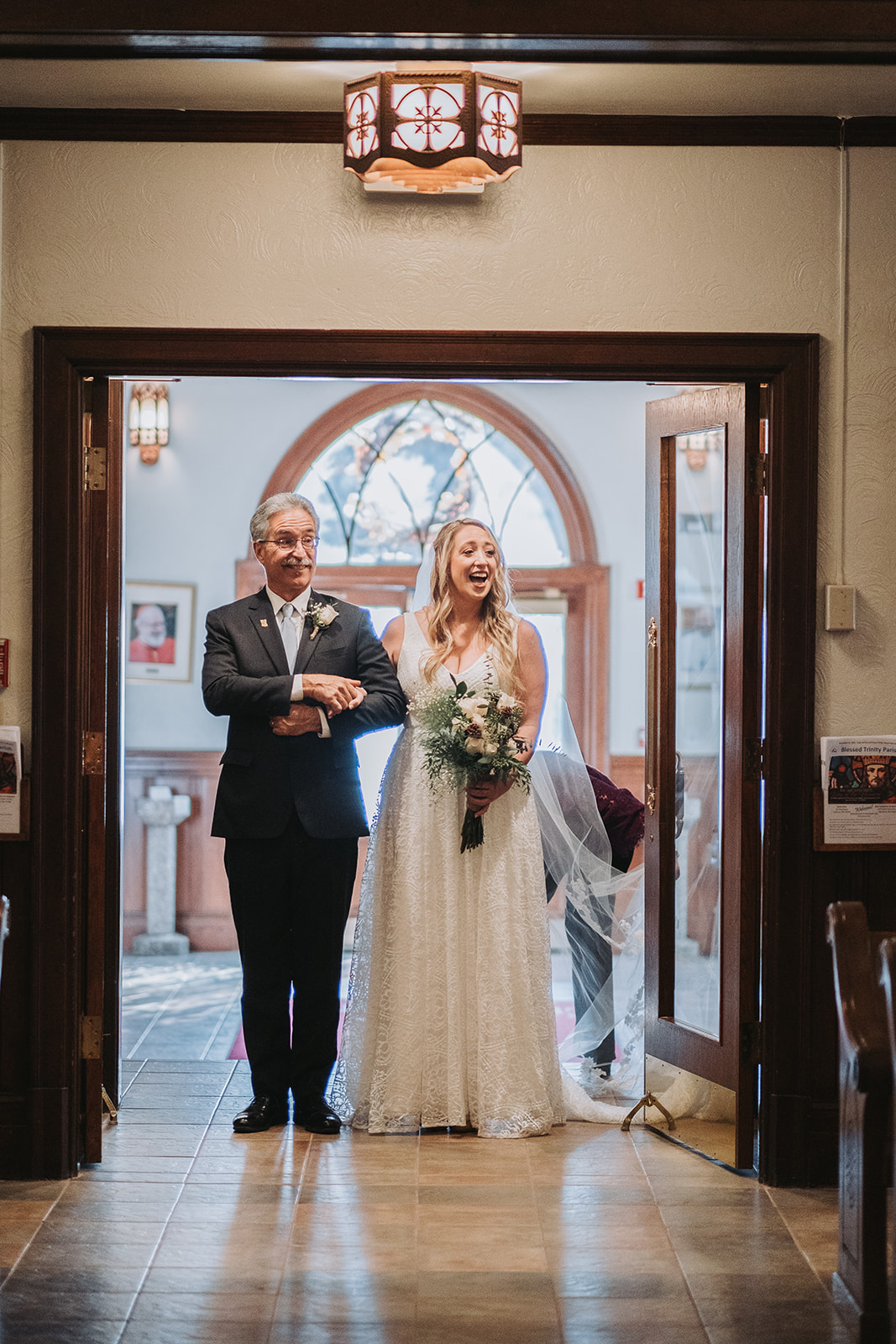 Father walking daughter down the isle to the groom.