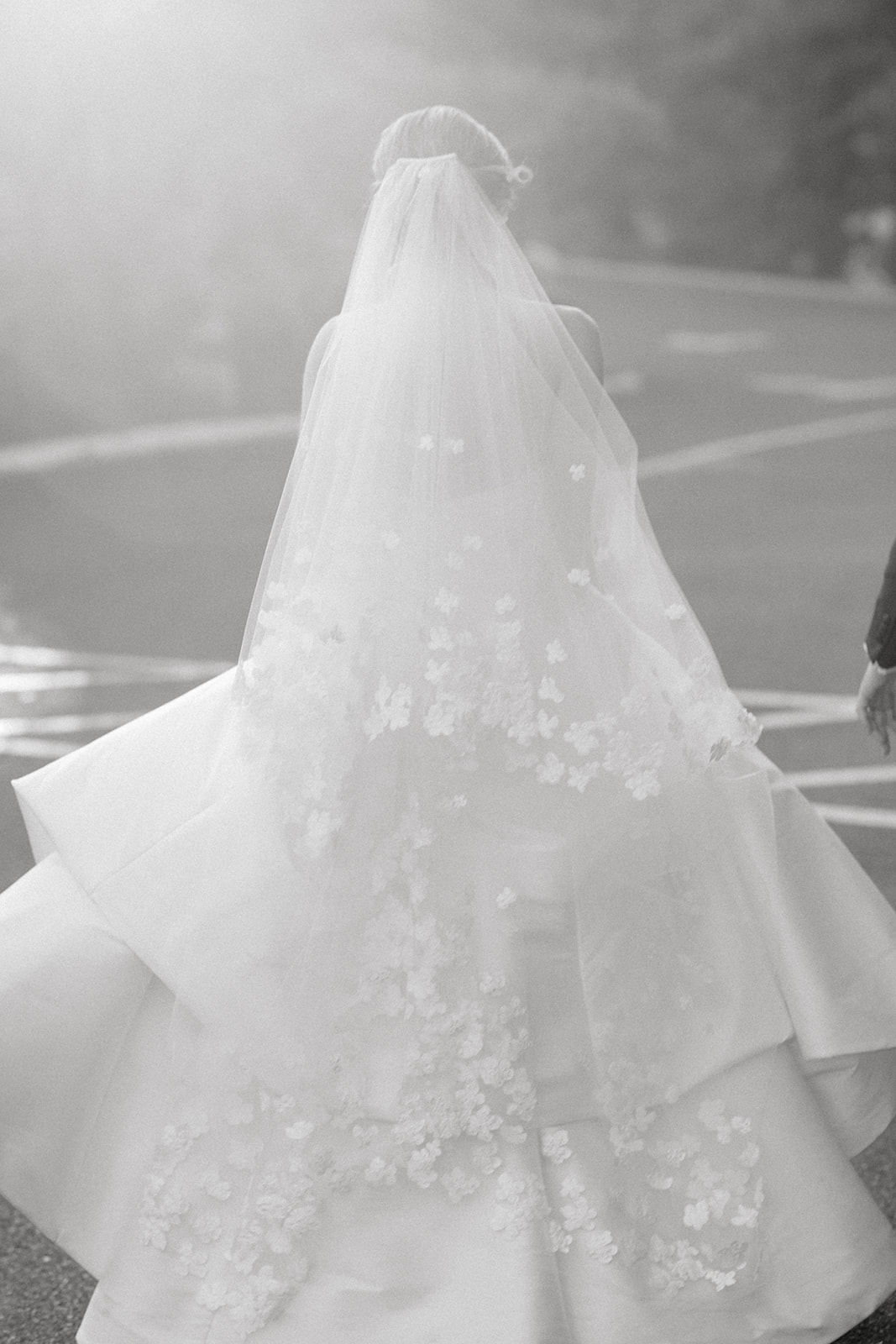 black and white photo of bridal veil with floral applique