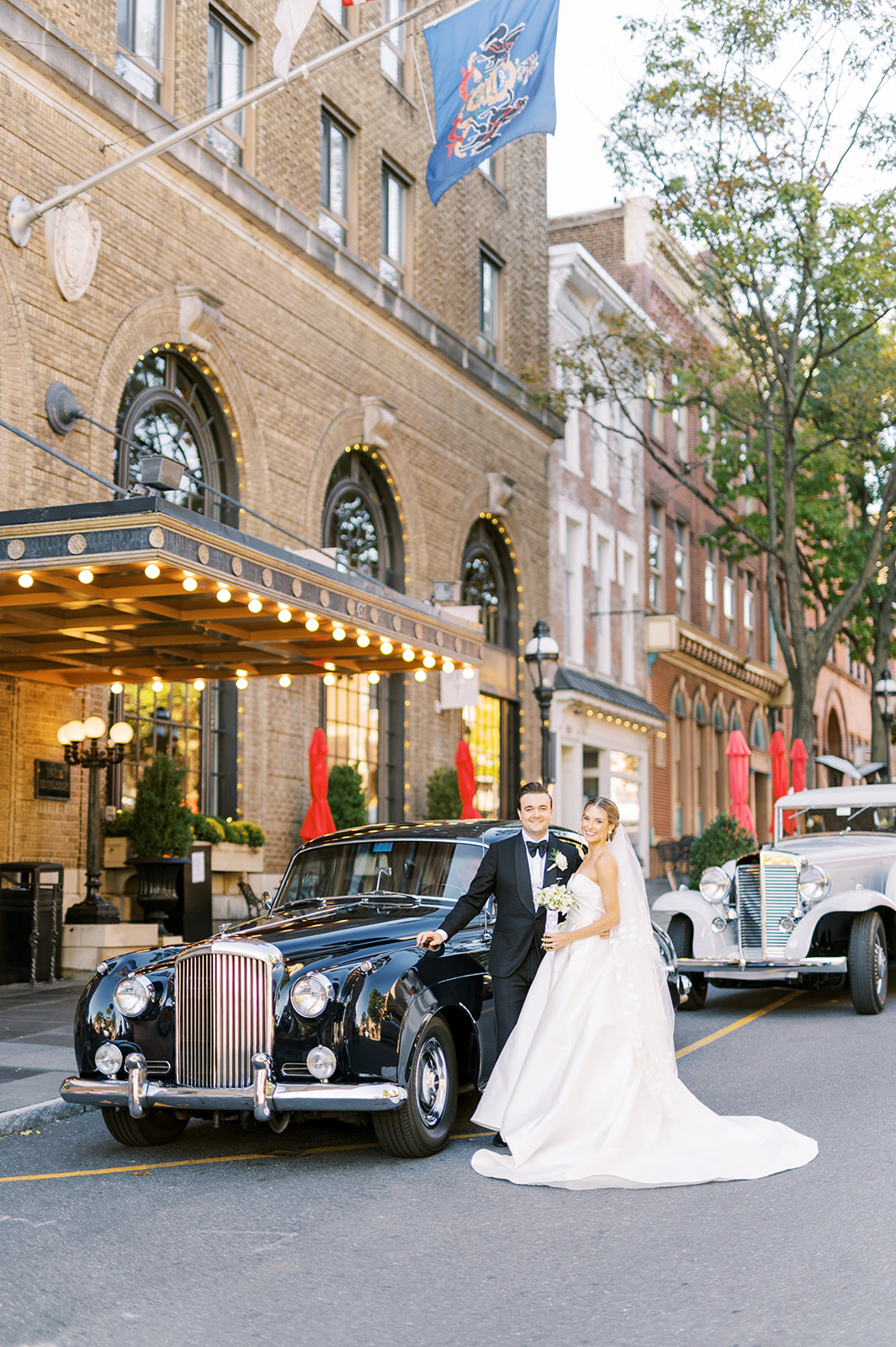 bride and groom with rolls royce outside hotel bethlehem