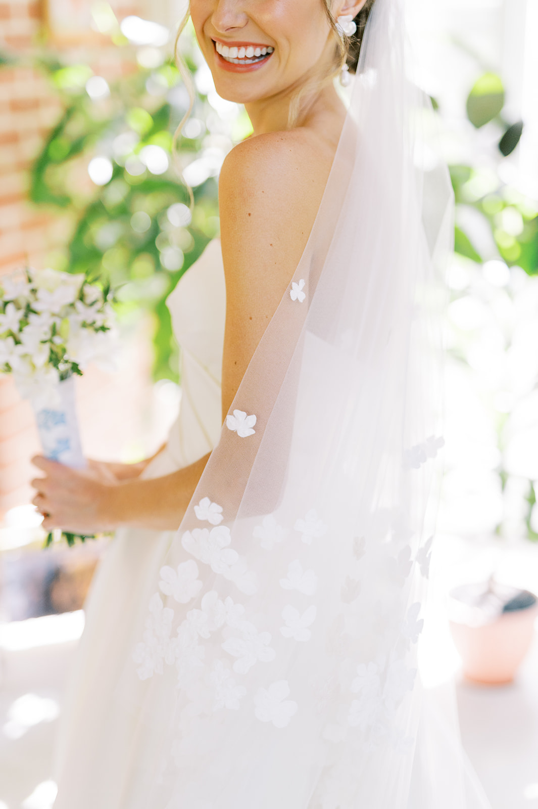 details of floral appliques on bridal veil
