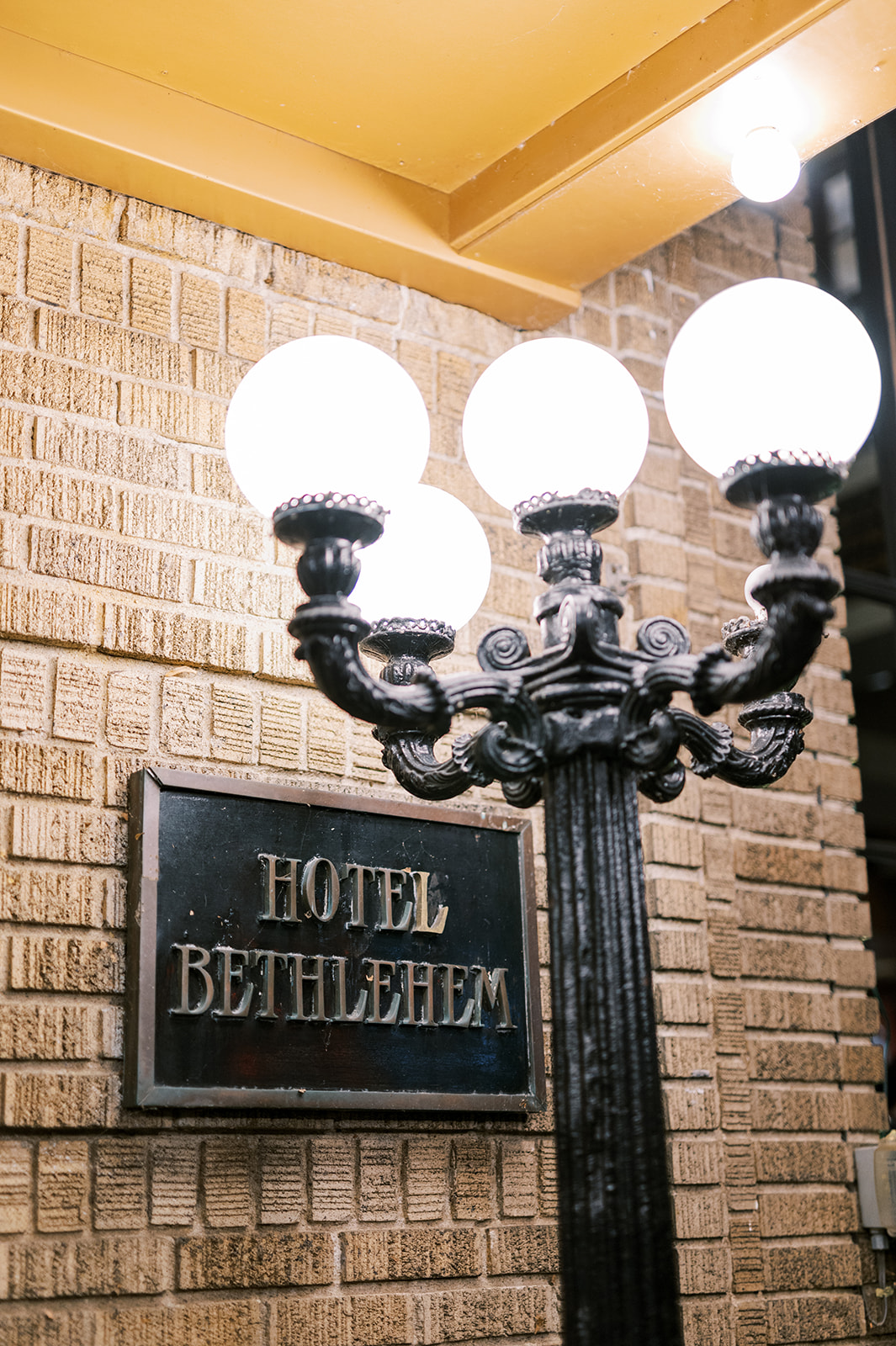 hotel bethlehem sign with lamp