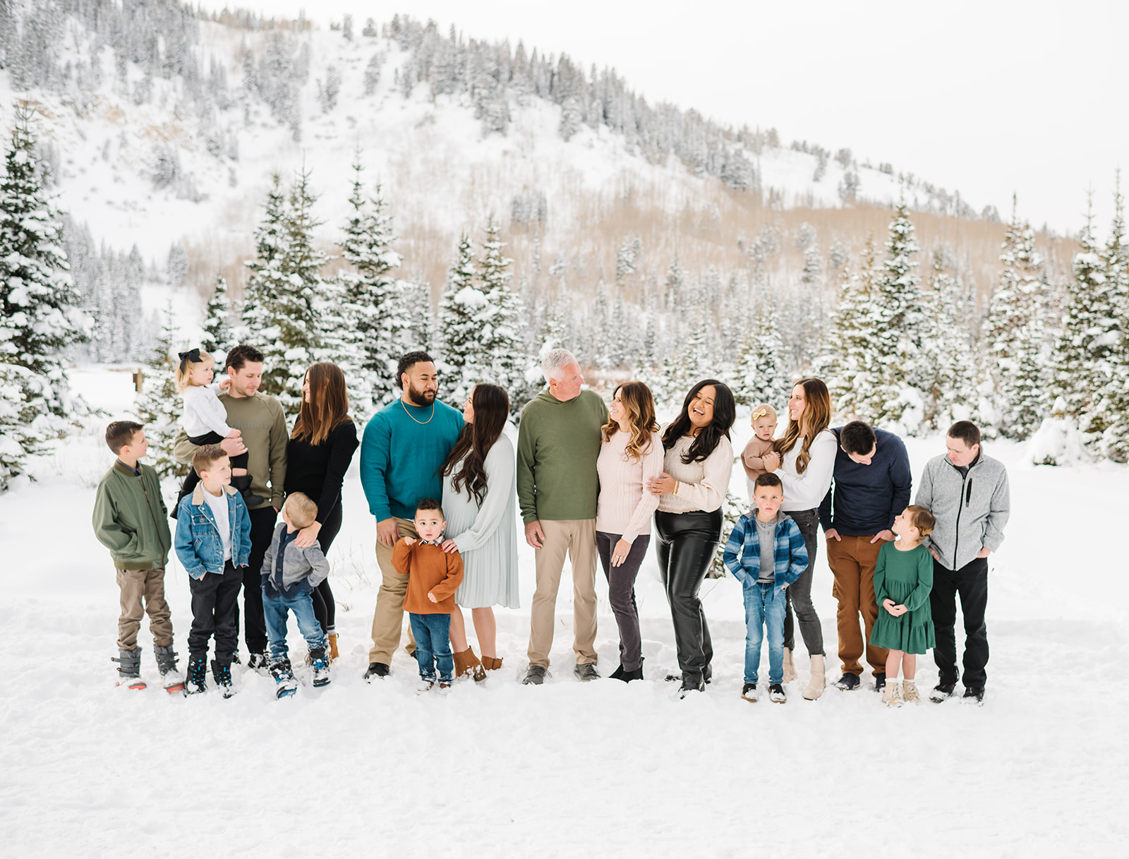 Full Extended Family poses at snowy Silver Lake up Big Cottonwood Canyon in Utah Family Photograph