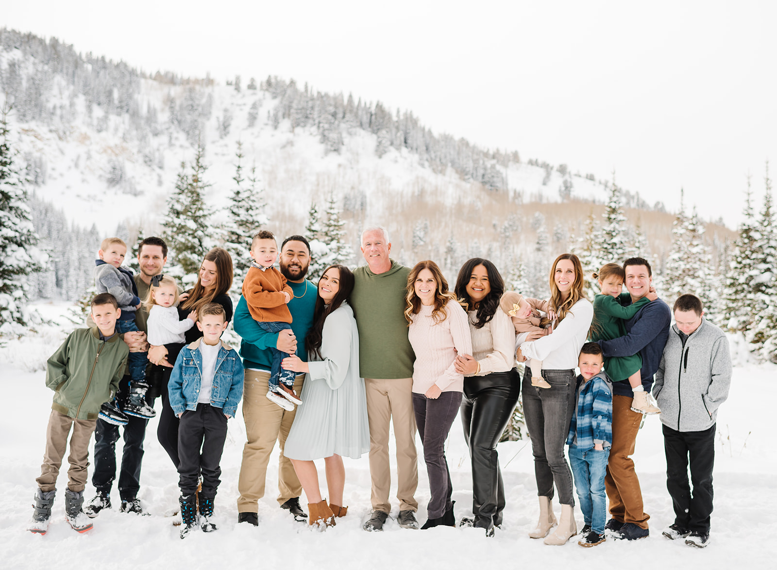 Full Extended Family poses at snowy Silver Lake up Big Cottonwood Canyon in Utah Family Photograph