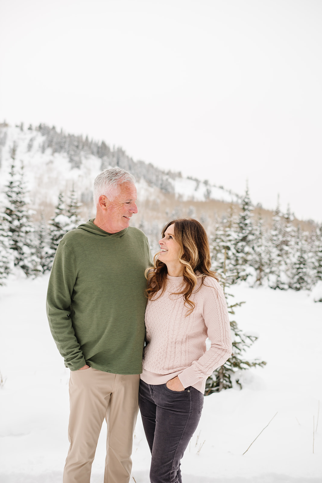 Grandparents pose at snowy Silver Lake up Big Cottonwood Canyon in Utah Family Photograph
