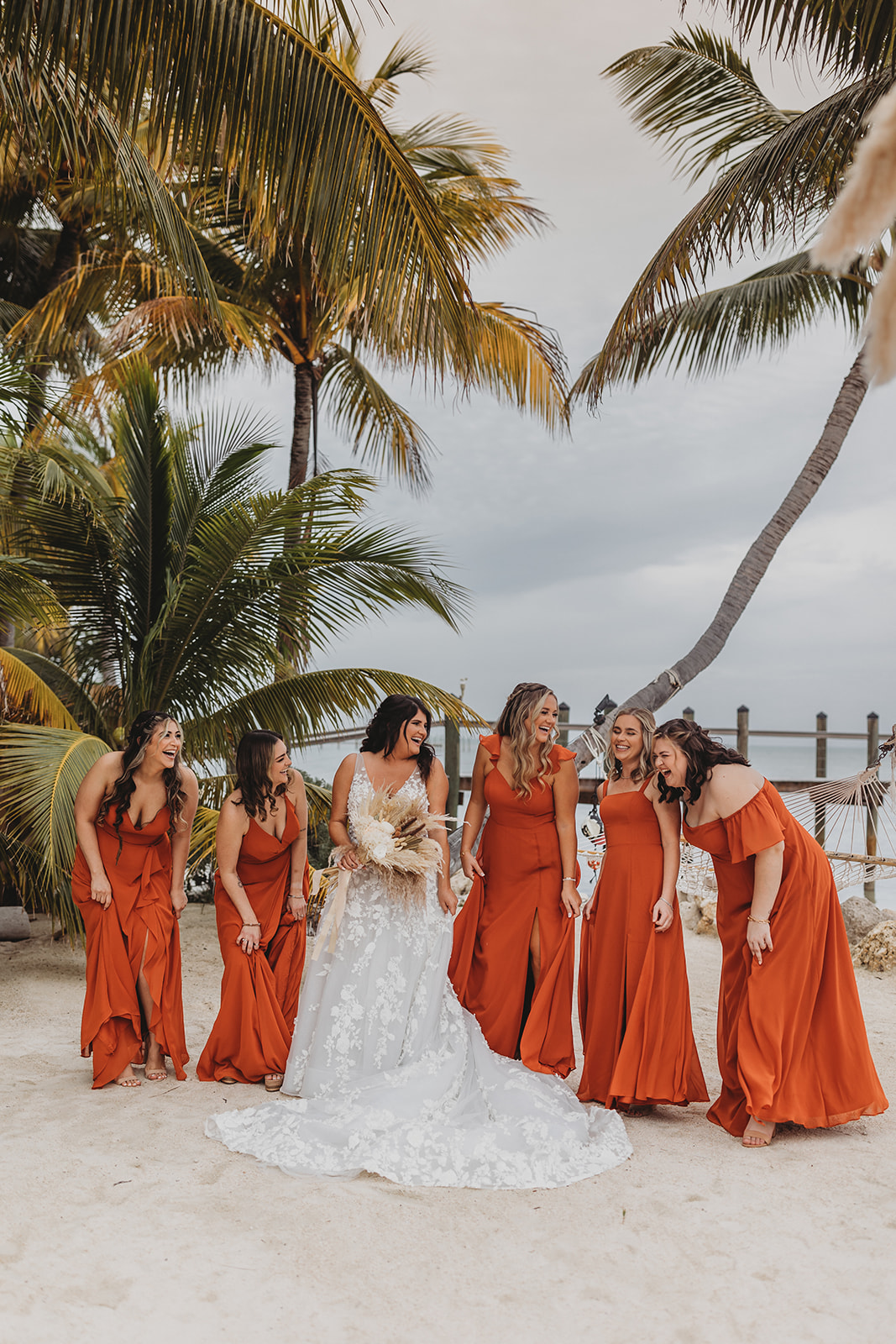 Islamorada Boho Wedding bridesmaids in burnt orange 