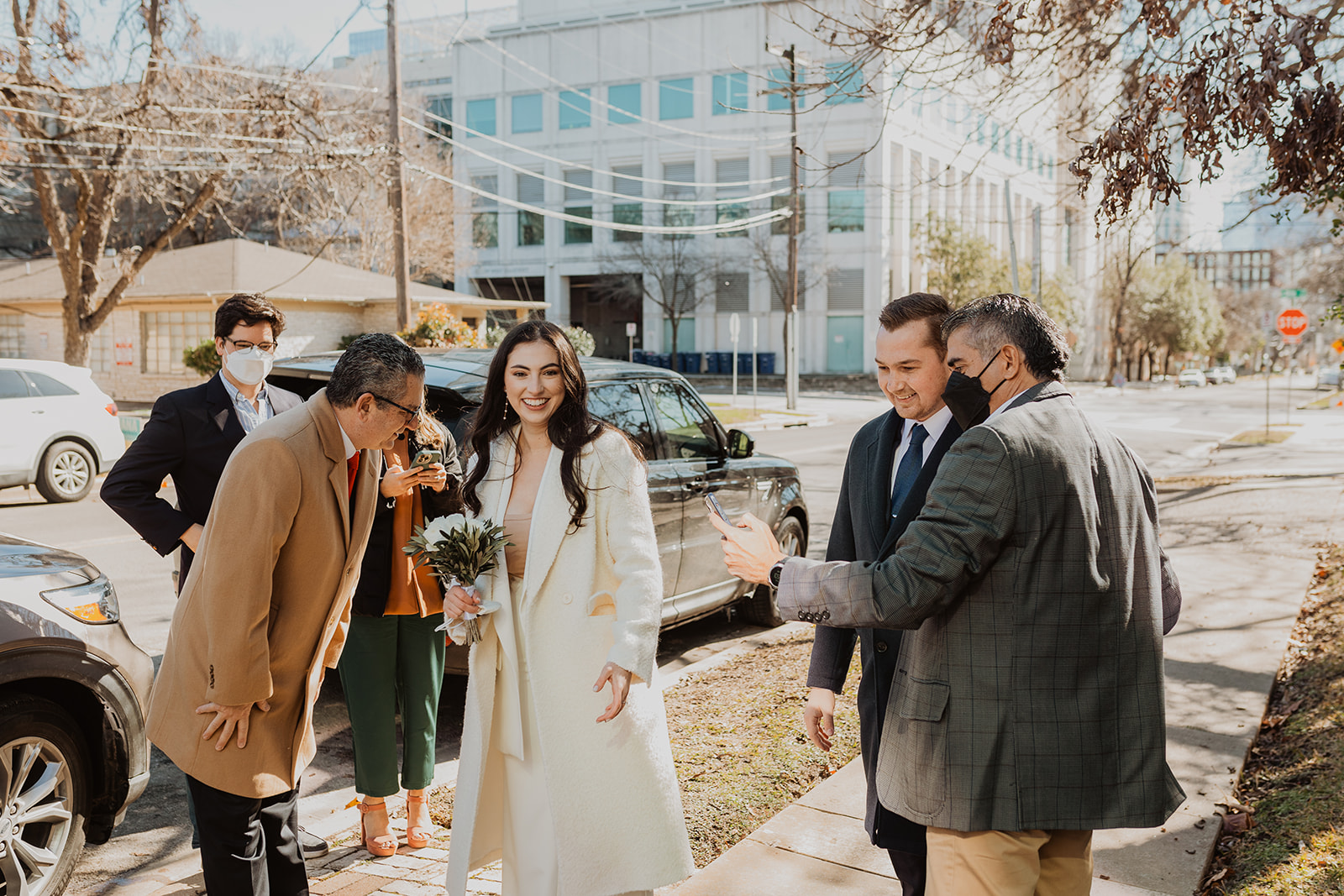 Diana and Alvaro with their families before their downtown Austin Courthouse Elopement