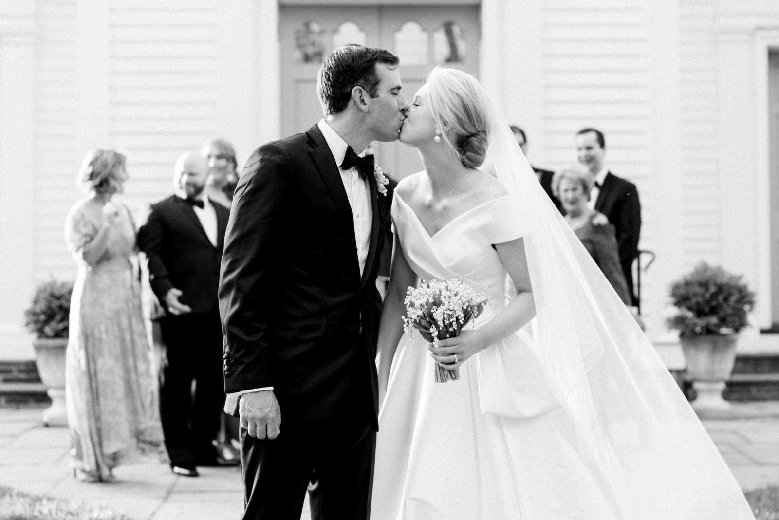 a sweet kiss between the bride and groom at their Fairfield Connecticut Wedding