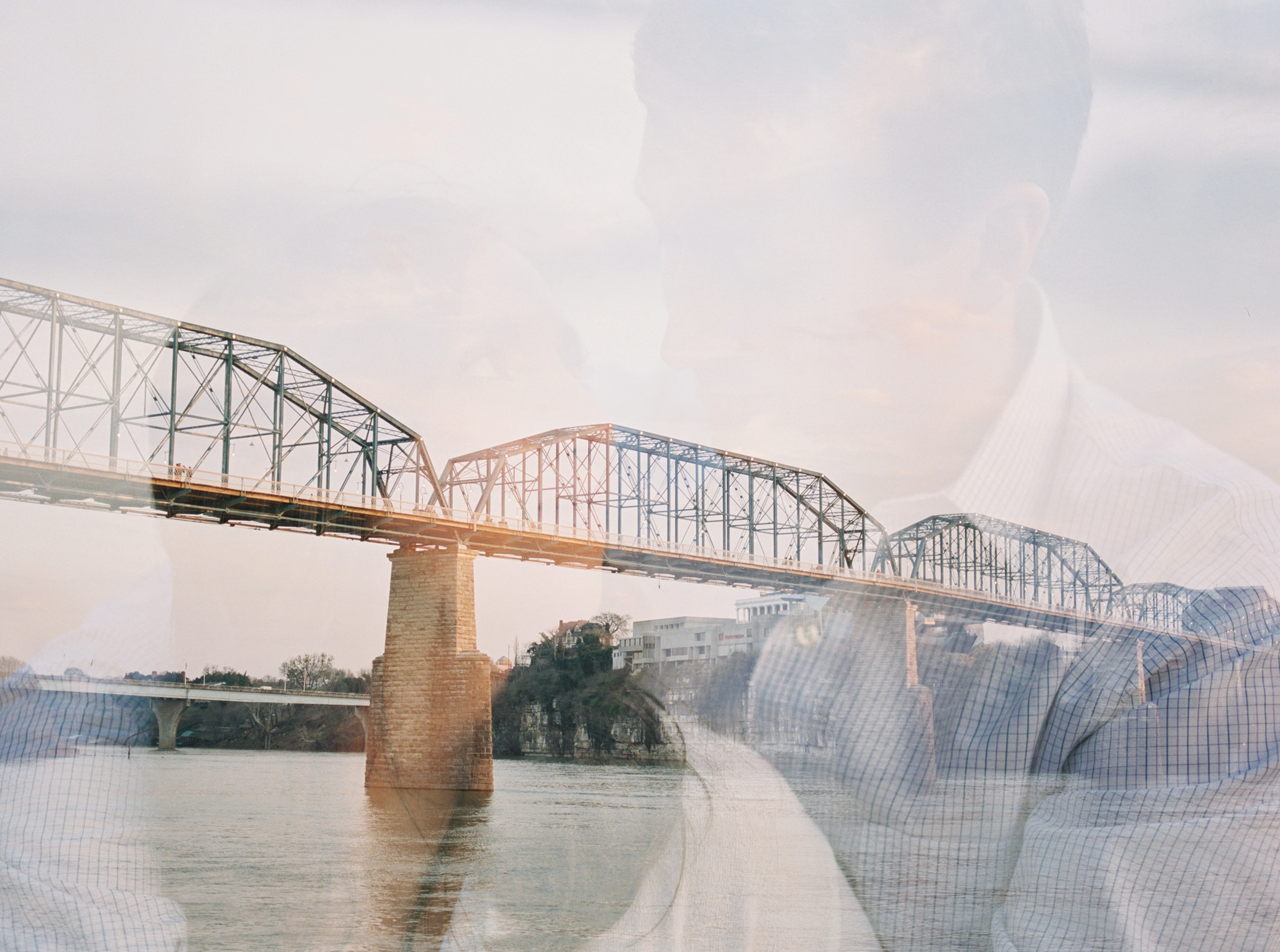 A double exposure from an engagement session in front of Walnut Street Bridge at Coolidge Park in Chattanooga, Tennessee
