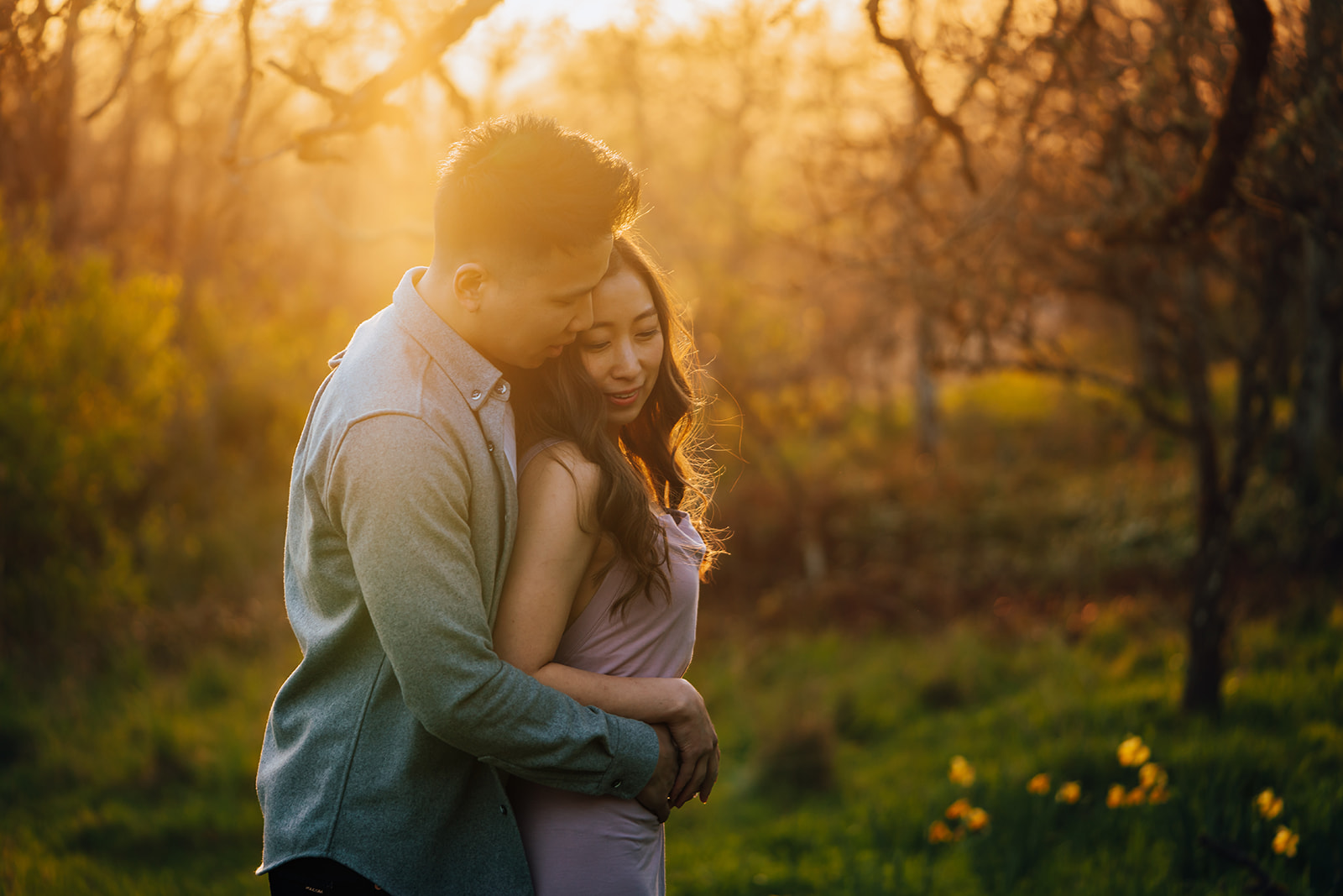 A spring engagement session with a couple in golden hour light. 