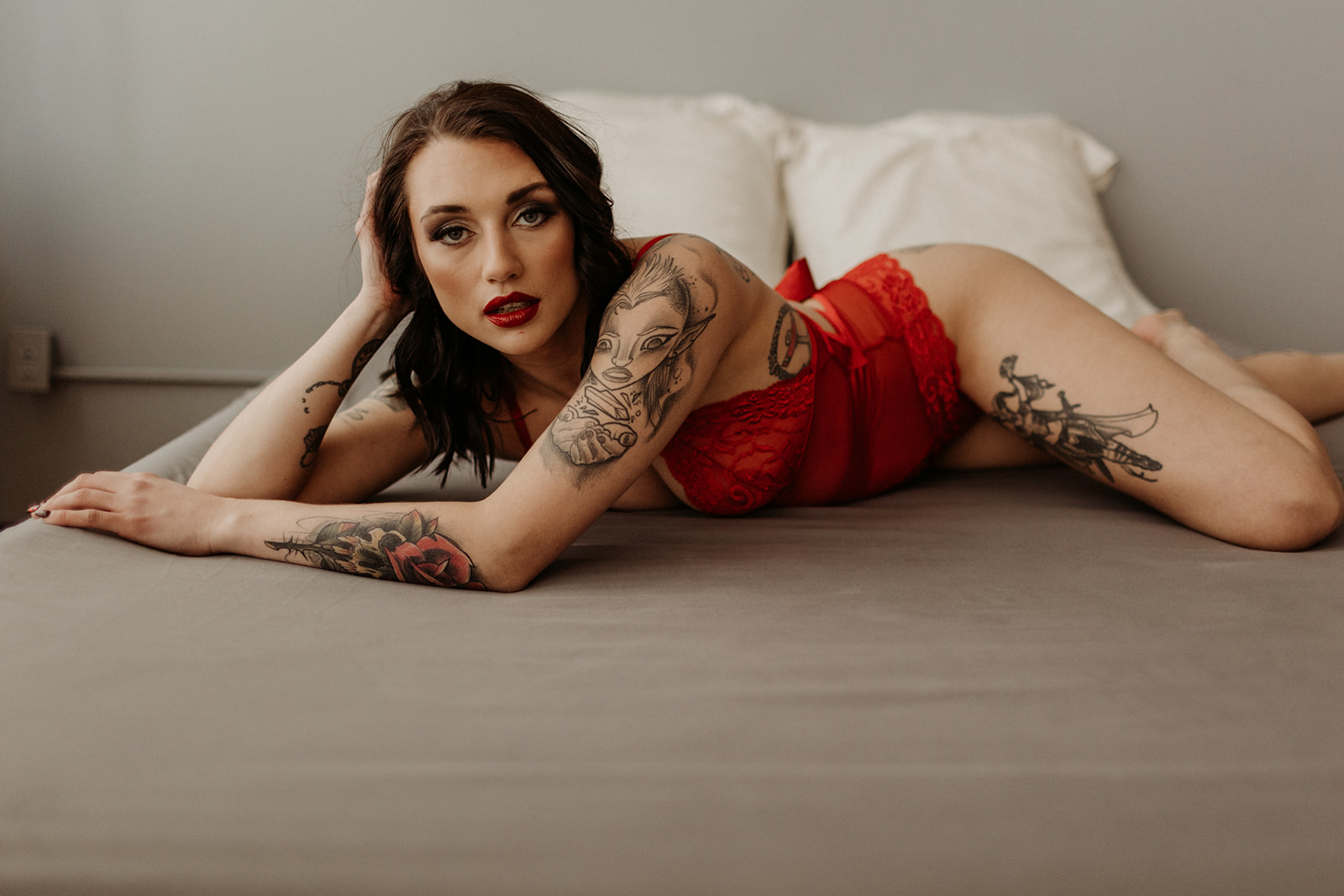 girl in red lingerie during tacoma boudoir shoot