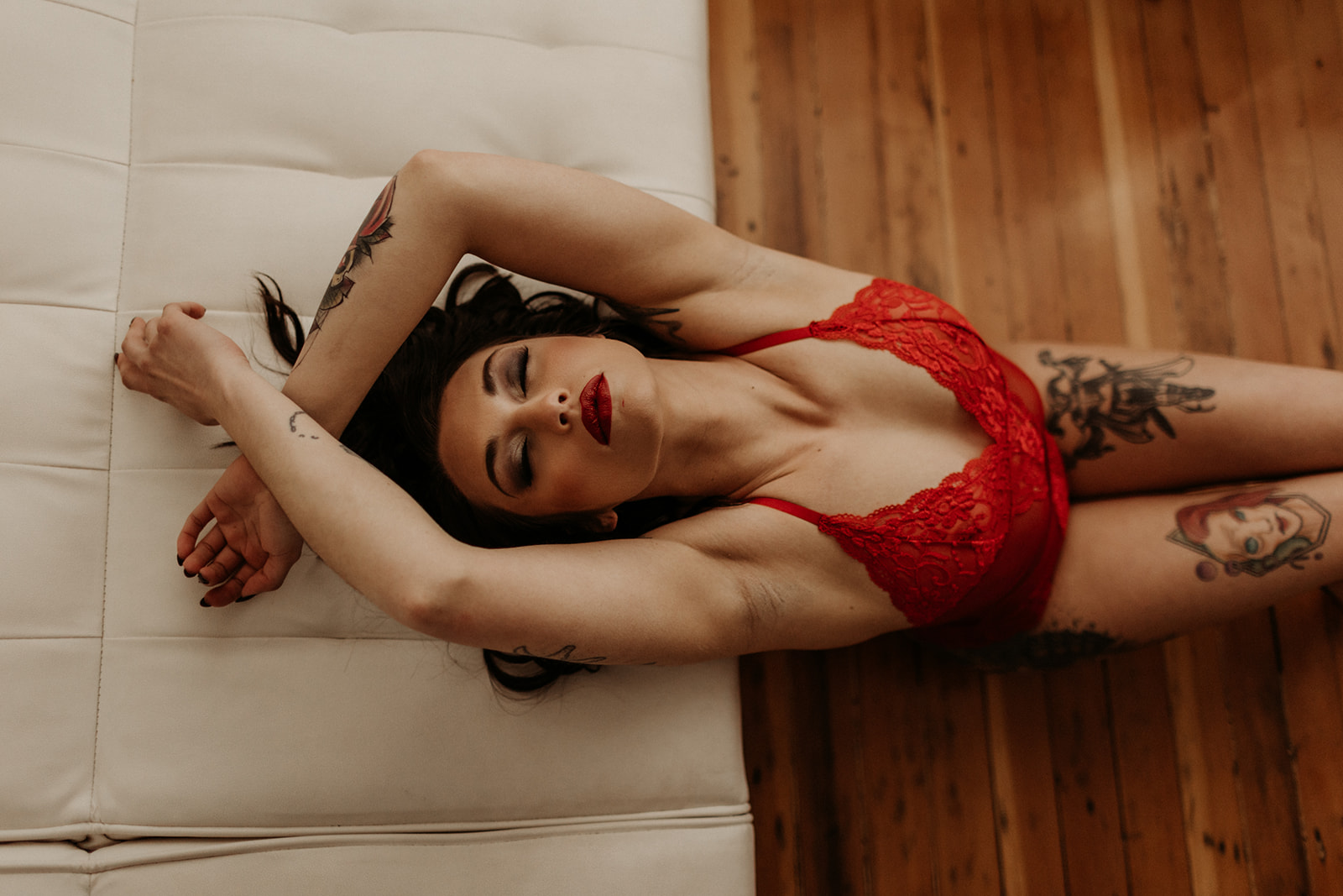 girl in red lingerie during tacoma boudoir shoot