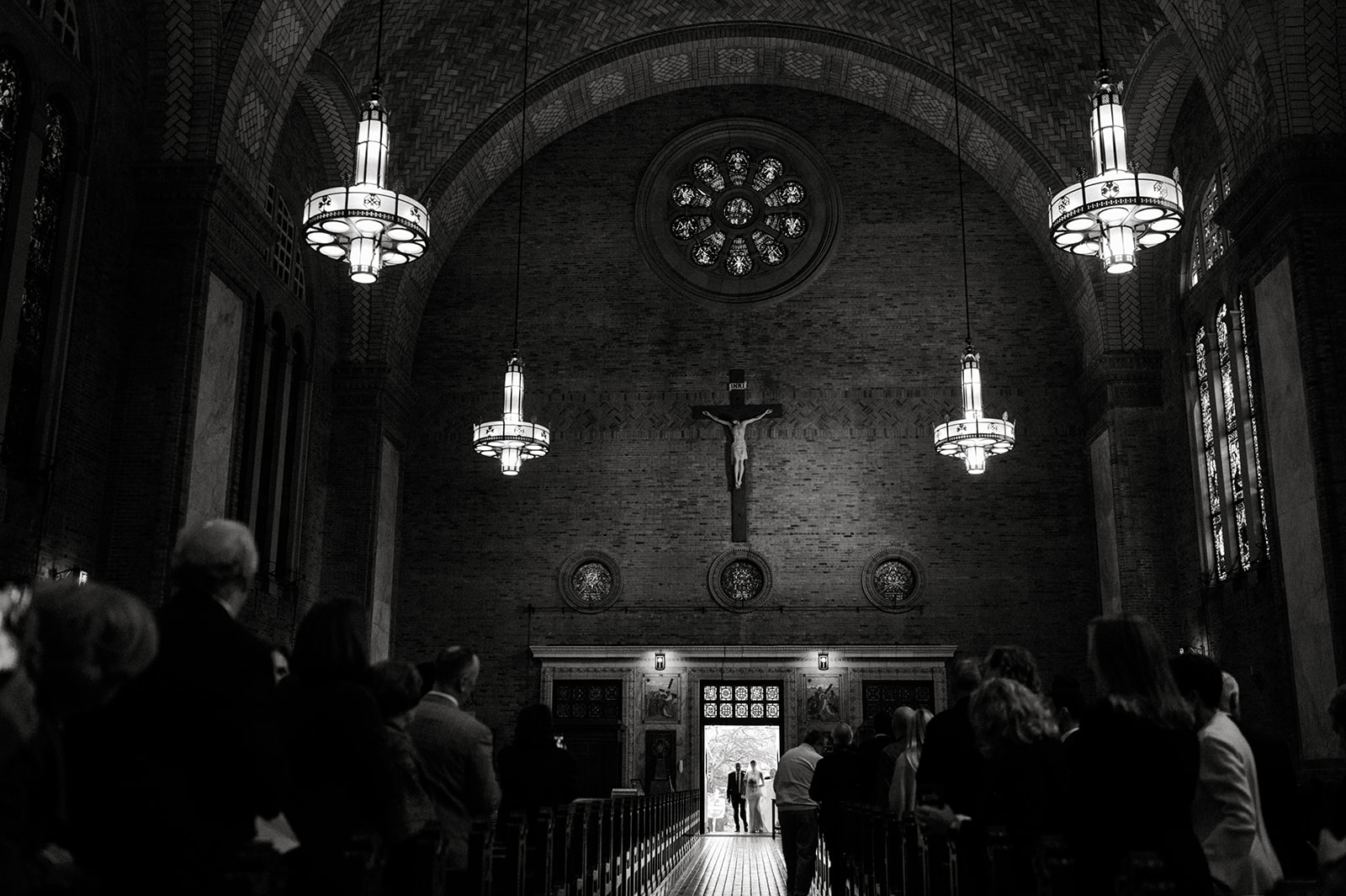 black and white photo artistic St. Patrick’s Cathedral  Rittenhouse Square philadelphia bride entering the isle