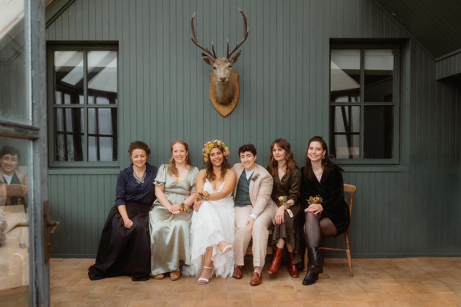 Becca and her lovely family and friends after their Tulach Ard Wedding ceremony at Isle of Skye, Scotland
