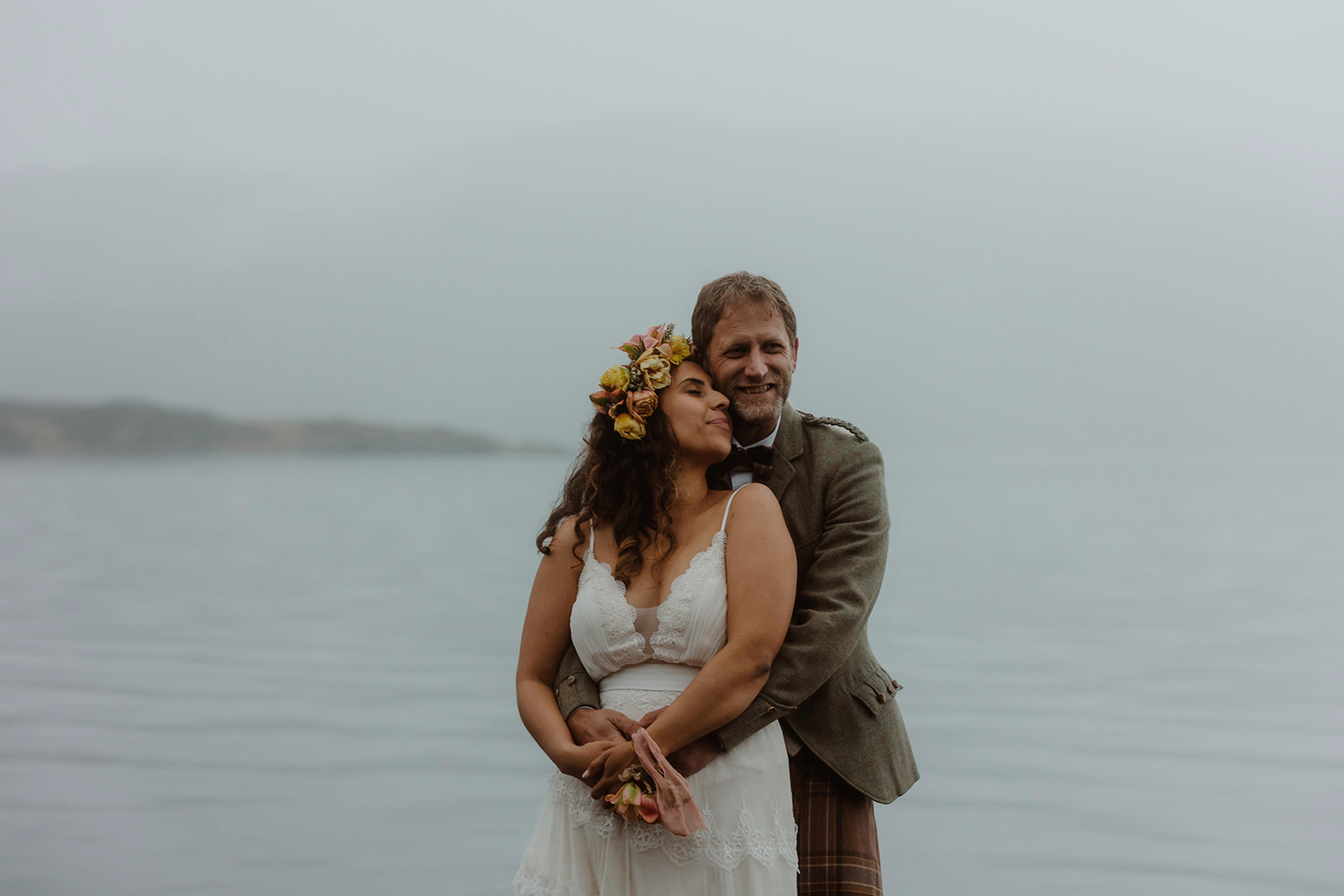 Rebecca and Simon capture the essence of their Isle of Skye elopement with the stunning beach as their backdrop.