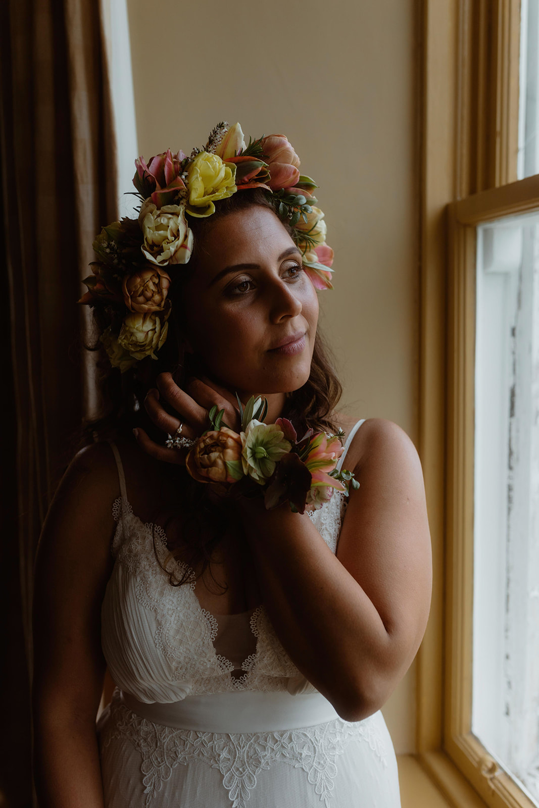 Rebecca and her beautiful flower crown and dress for her Isle of Skye elopement