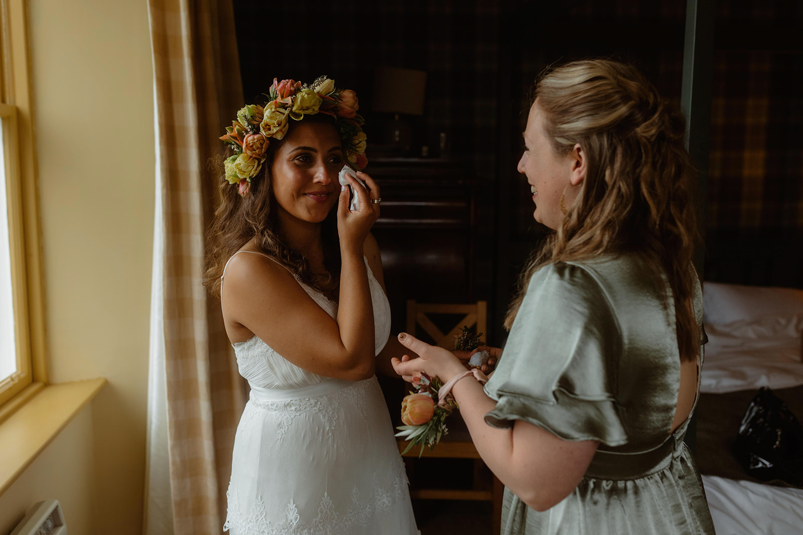 Rebecca and her beautiful flower crown and dress for her Isle of Skye elopement