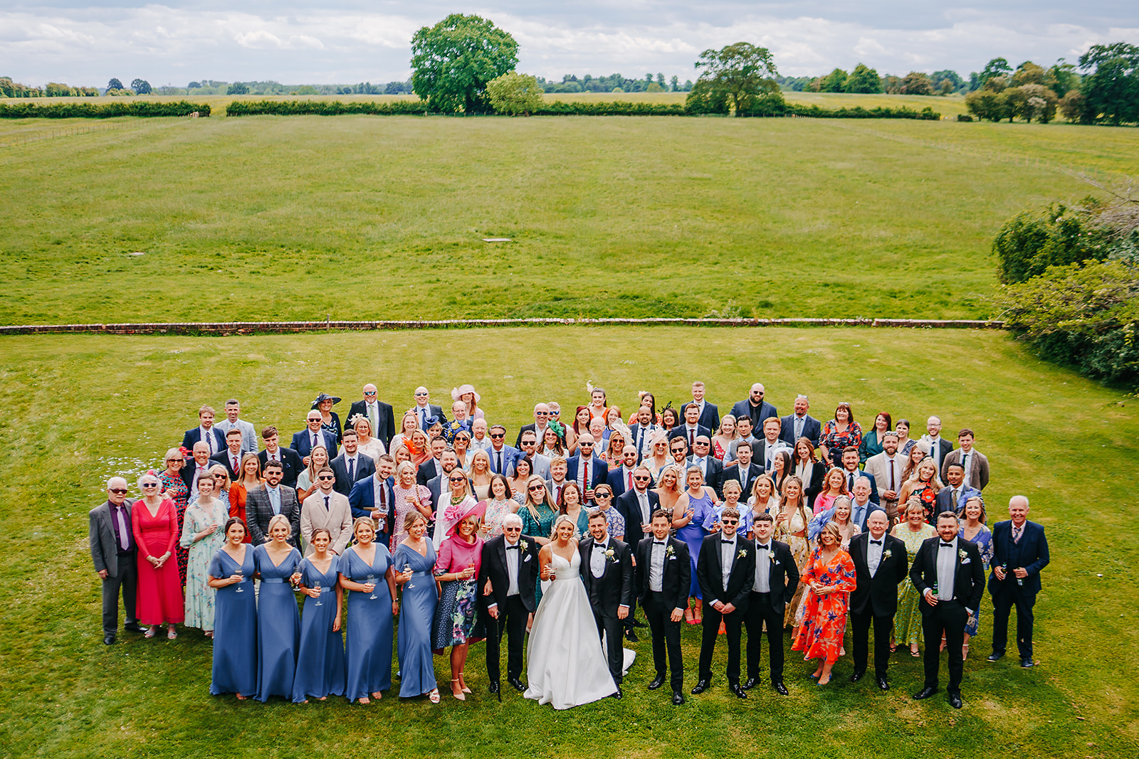 big wedding group photo at hornington manor