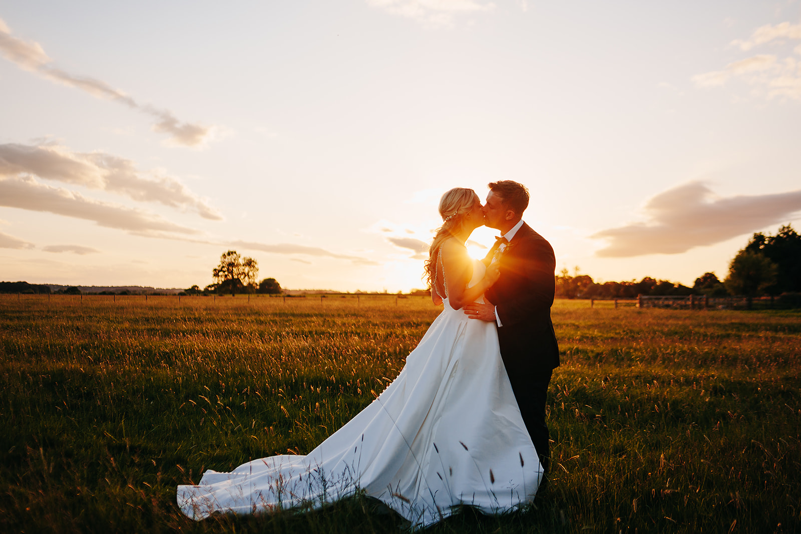 bride and groom enjoying sunset at hornington manor