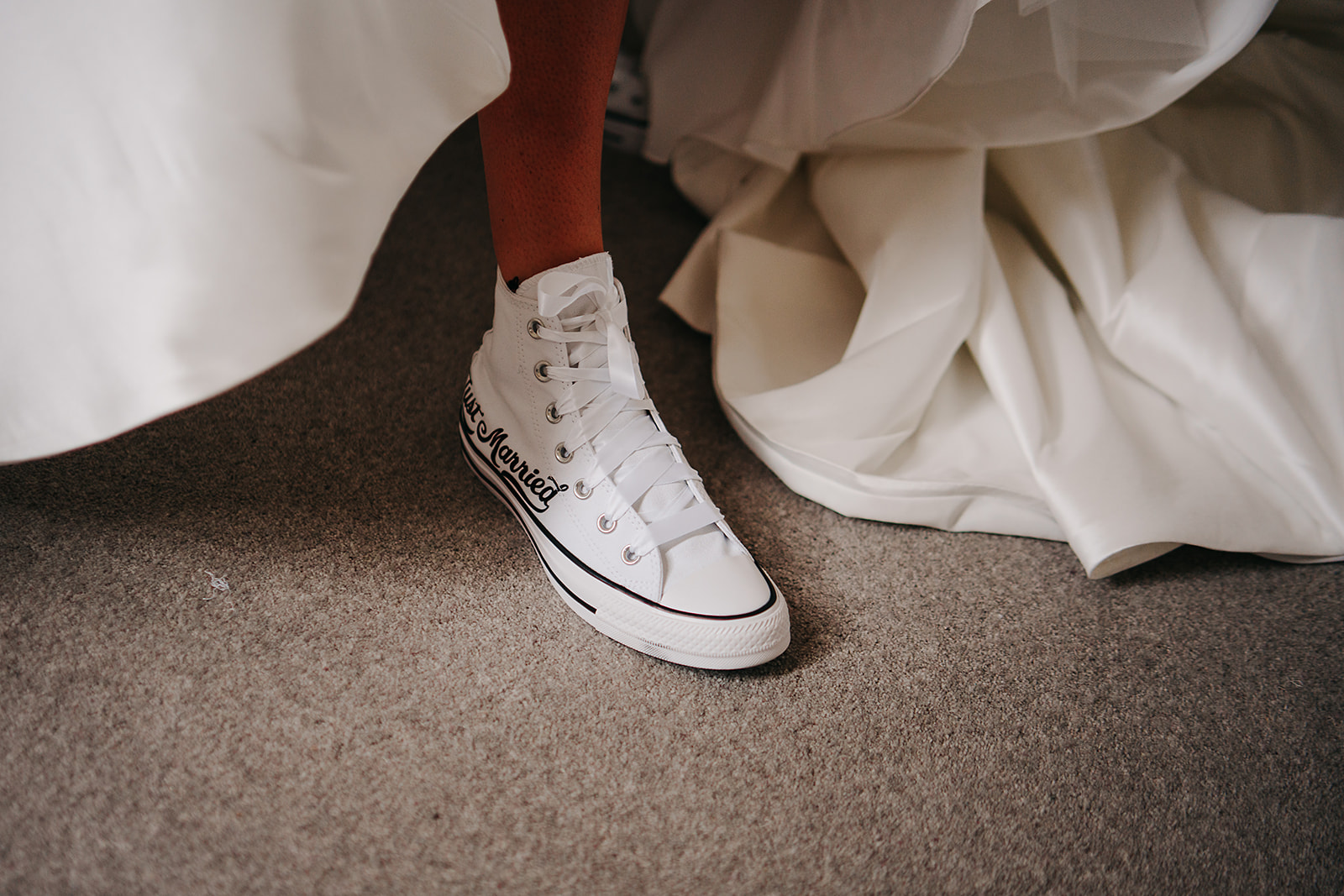 Bride wearing trainers at hornington manor