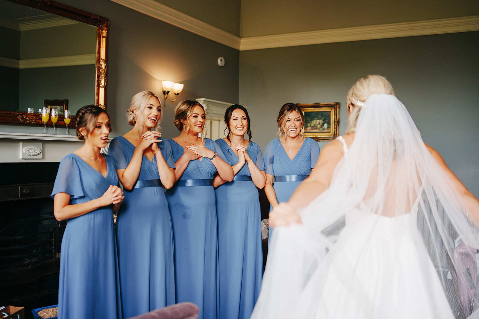 Bridesmaids see bride