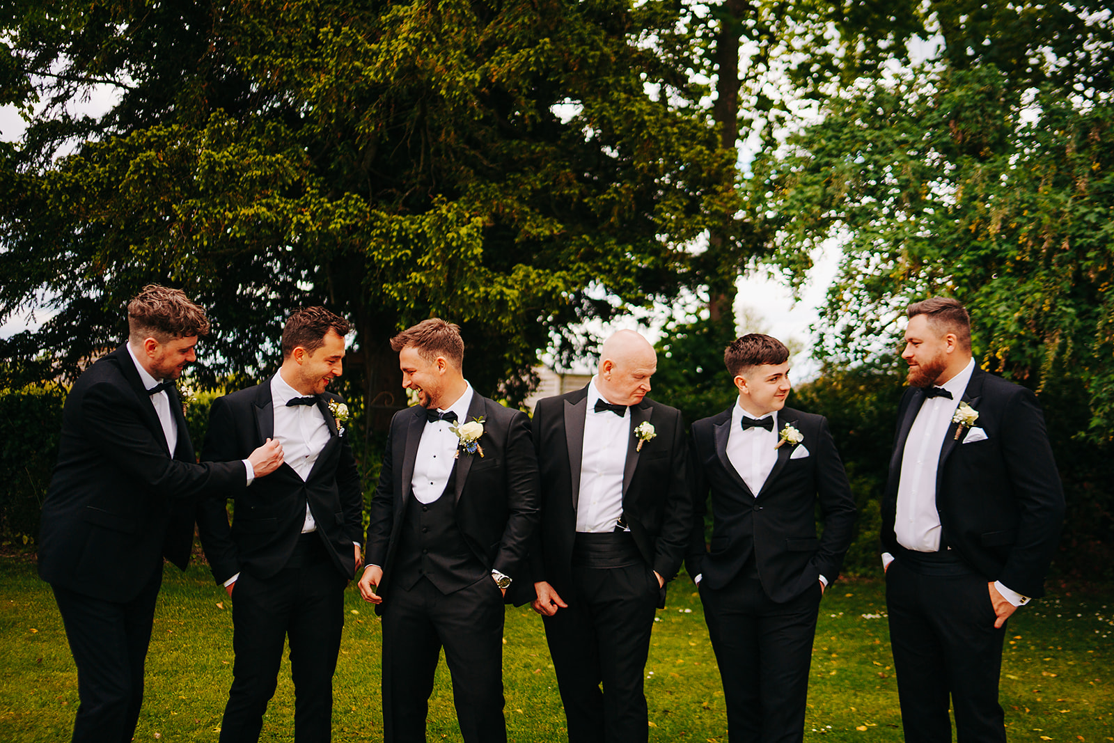 Groom and groomsmen on the lawn at hornington manor