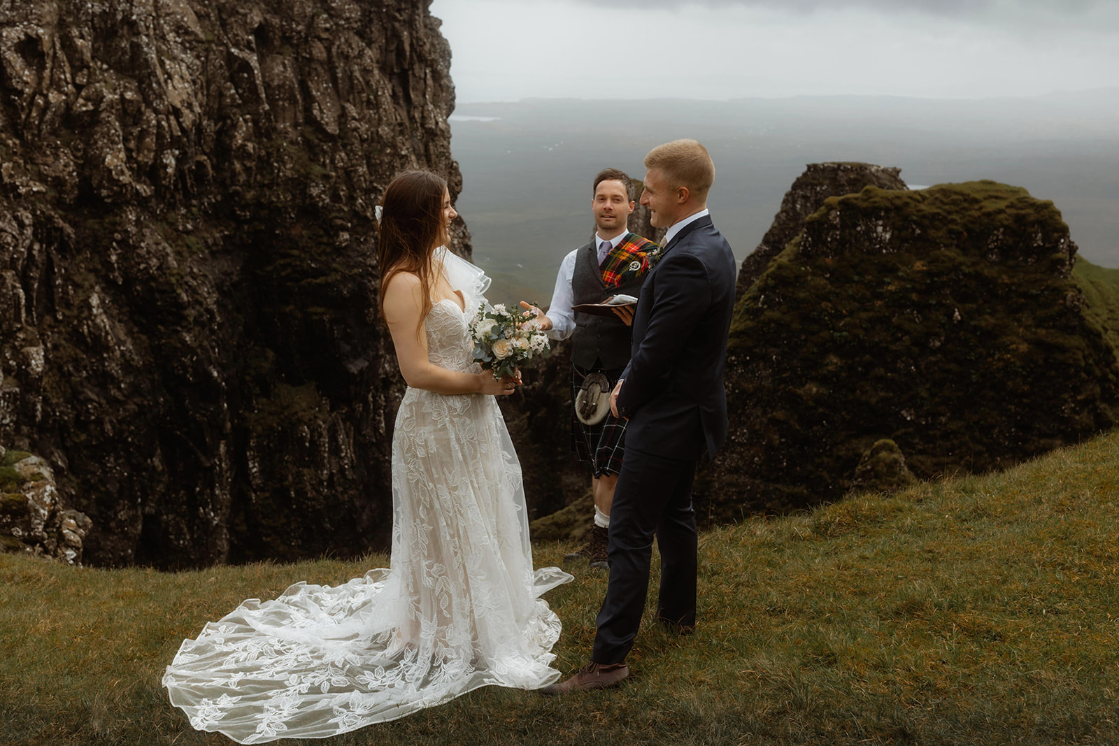 Witness Emma and Matthew's enchanting elopement ceremony amidst the mystical Quiraing, Isle of Skye.