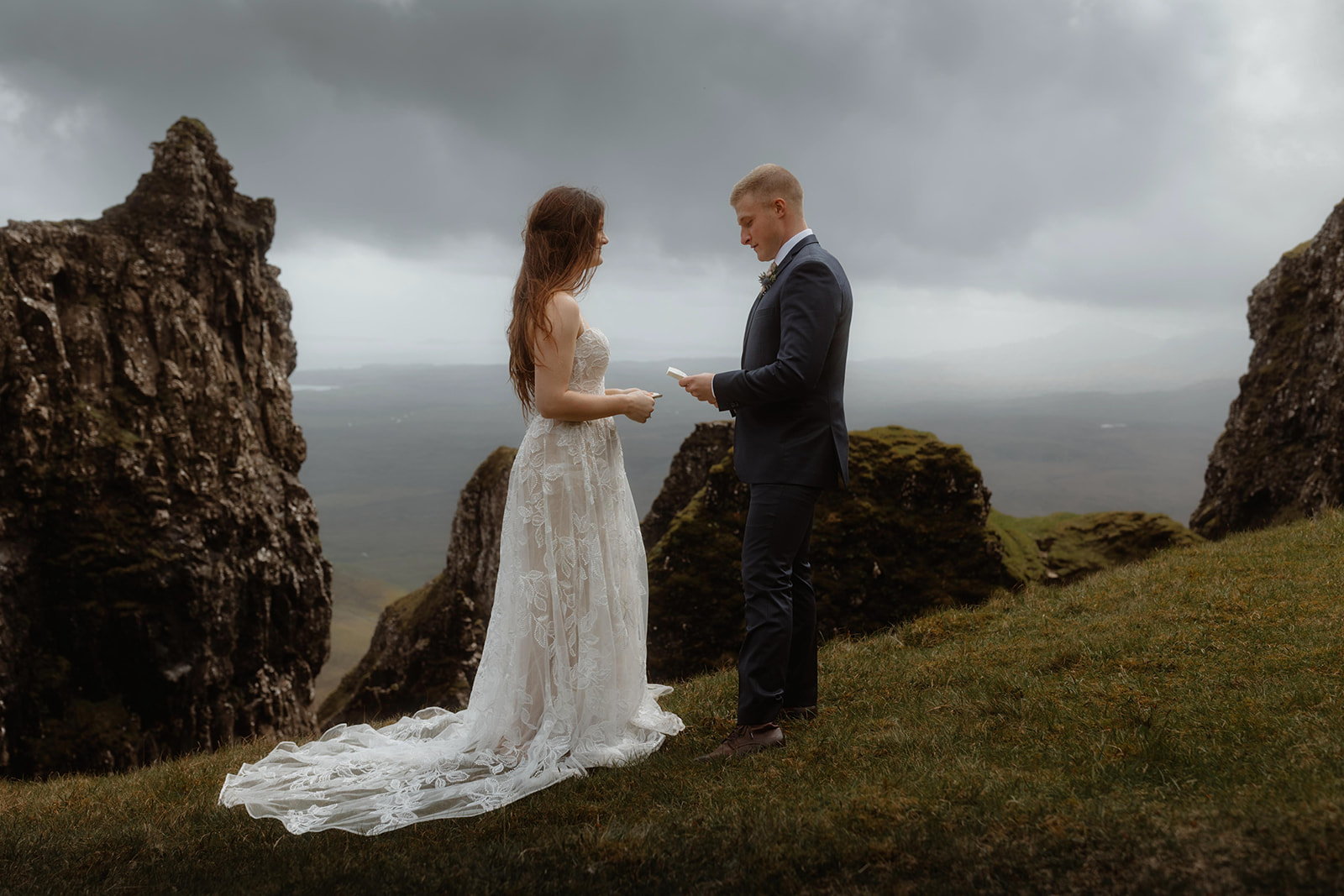 Experience the enchantment of Emma and Matthew's elopement ceremony set against the breathtaking Quiraing, Isle of Skye.