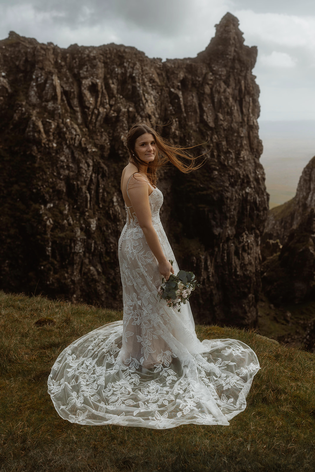Emma and her beautiful dress for her Quiraing, Isle of Skye elopement