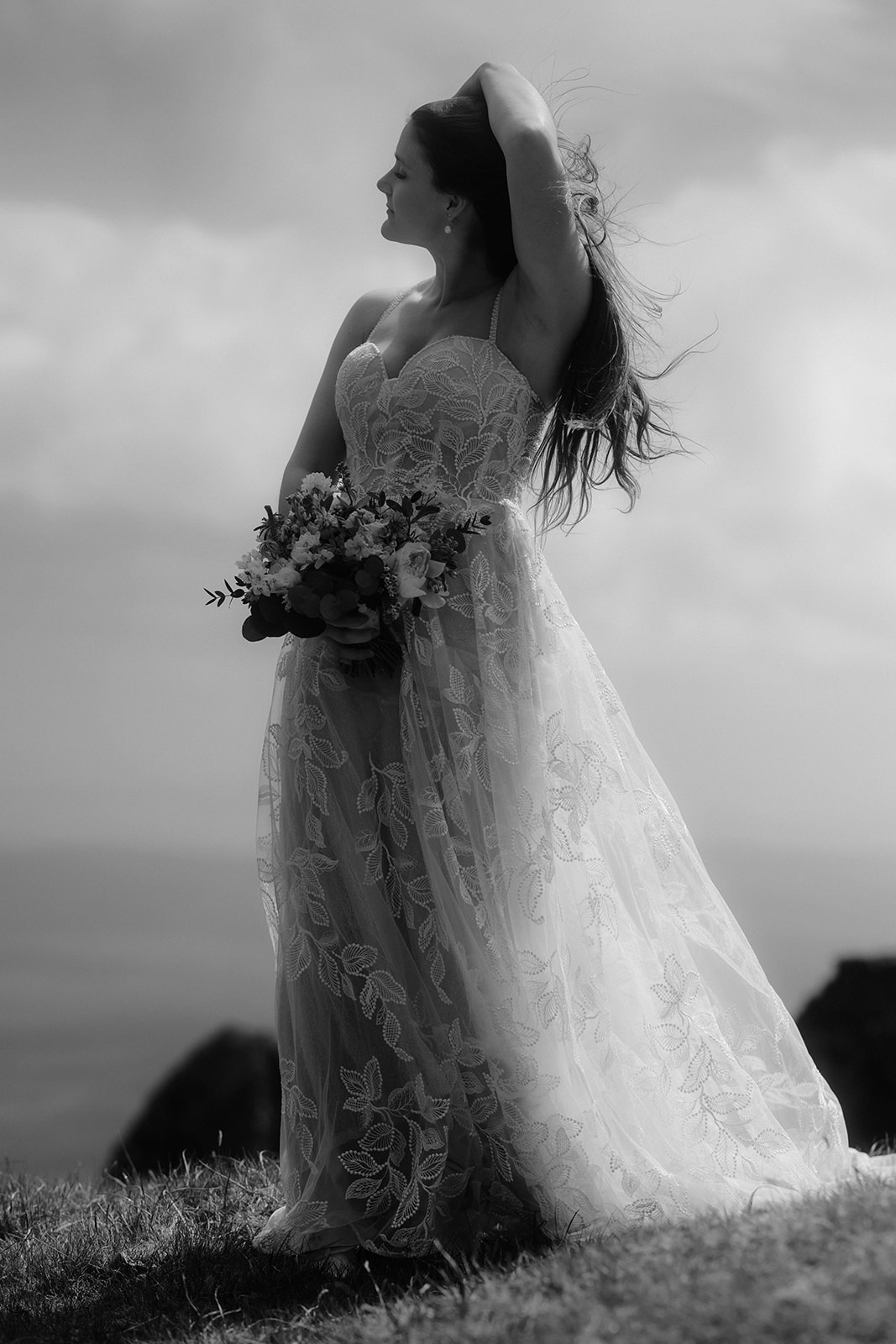 Emma and her beautiful elopement dress for her Quiraing, Isle of Skye elopement
