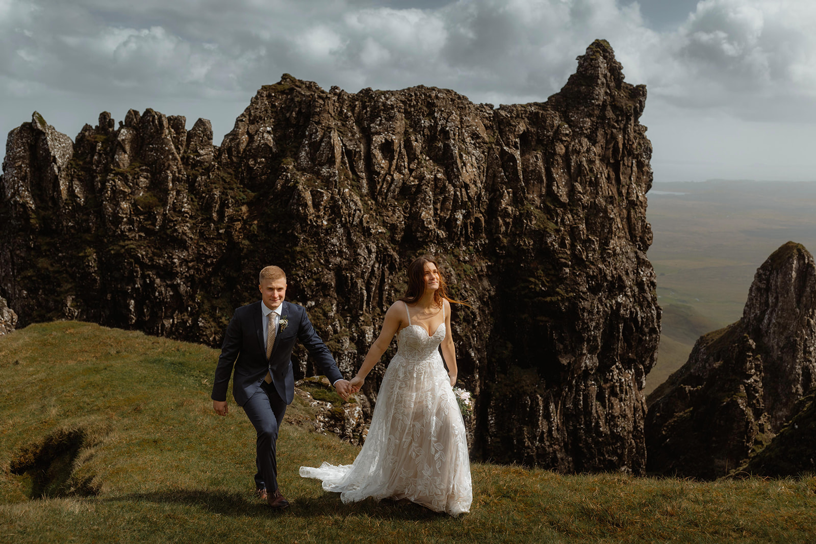Emma and Matthew walked hand in hand as they stroll around the picturesque Isle of Skye during their elopement day