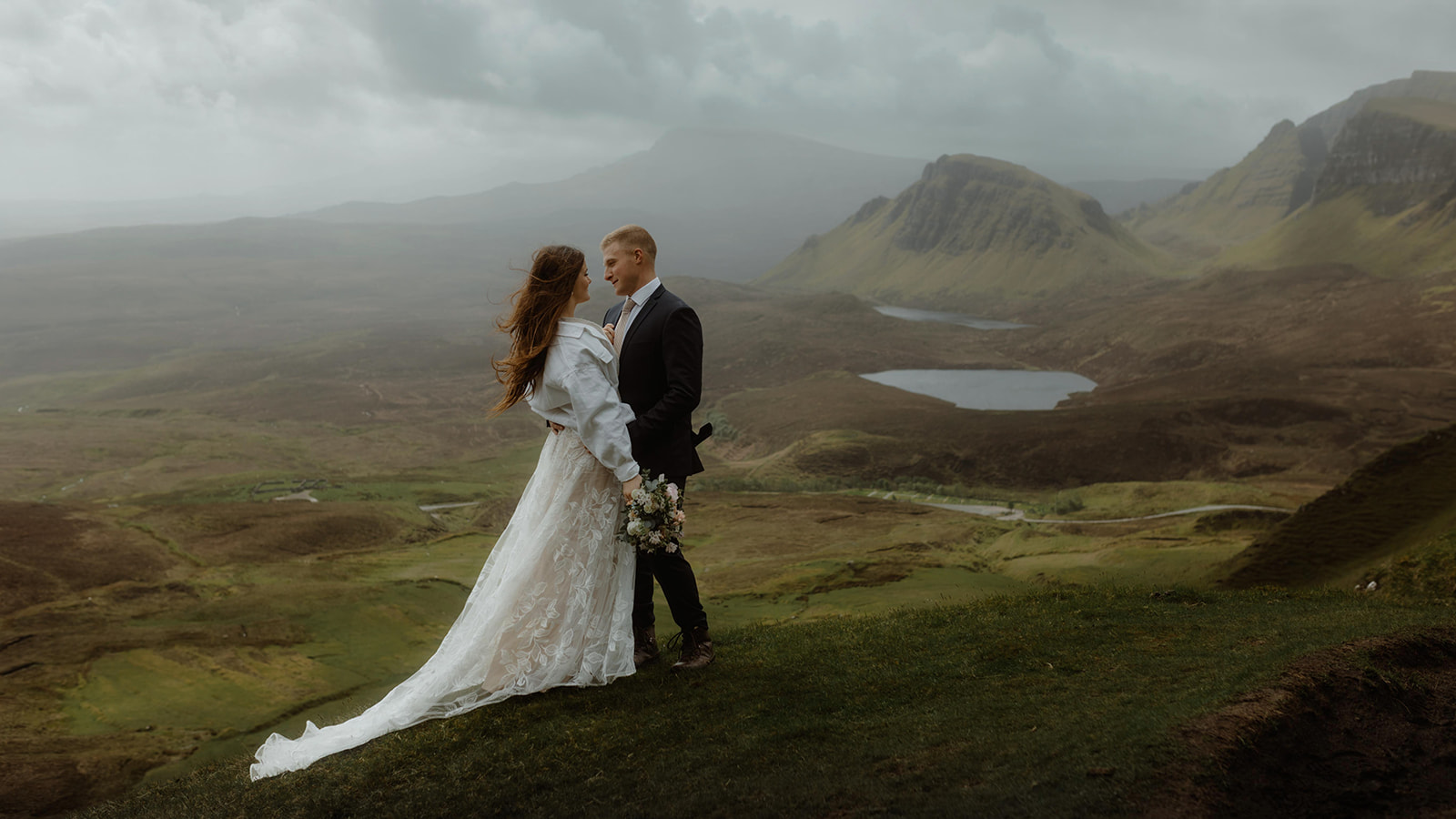 Emma and Matthew looking lovingly at each other on the Isle of Skye during their elopement day