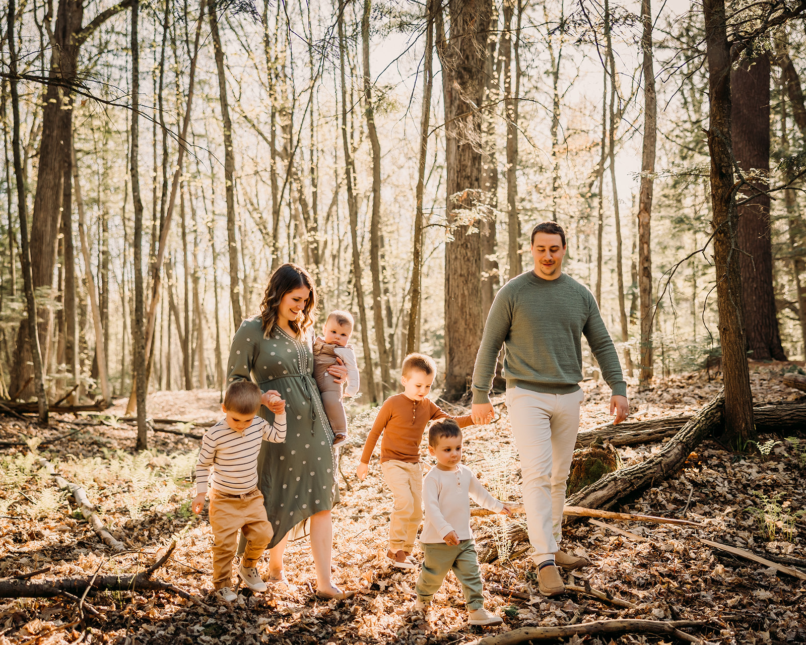 Loving family embracing the beauty of the Ottawa Forest in photos