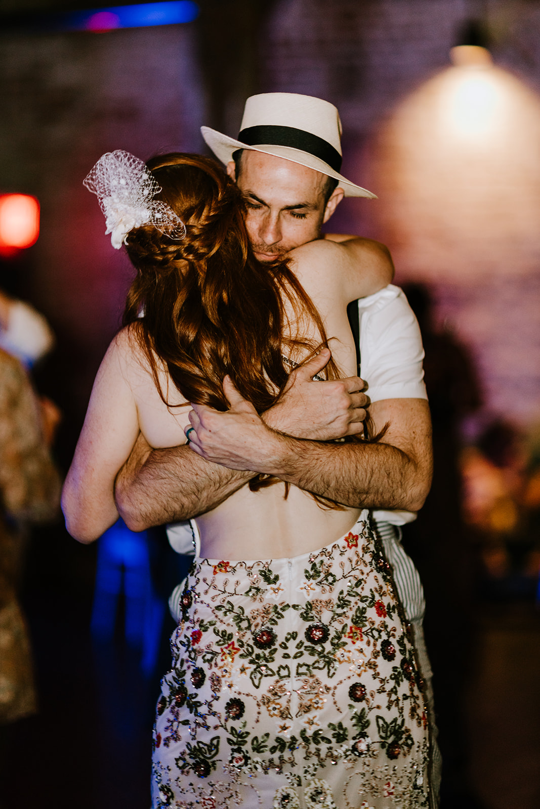 Bride and Groom hugging at Capulet in the Bywater