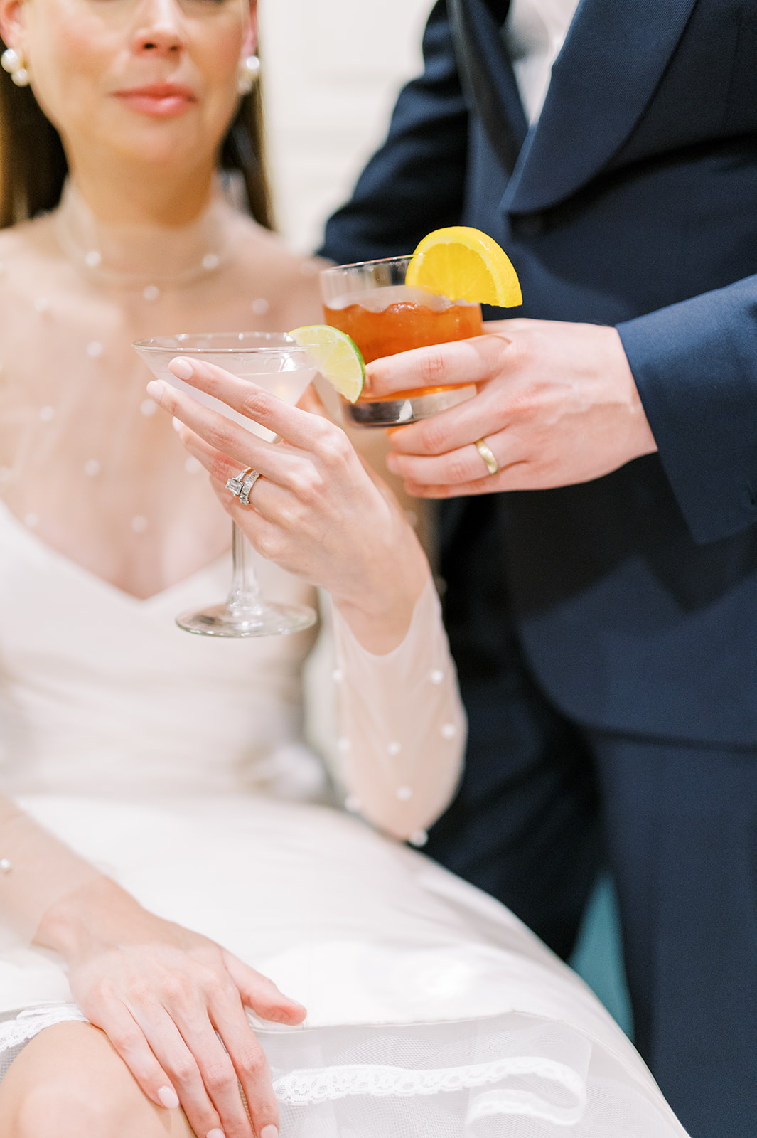 bride and groom cheers their chic cocktail at Bright Summer Stone Harbor Golf Club Wedding in Yellow and Blue