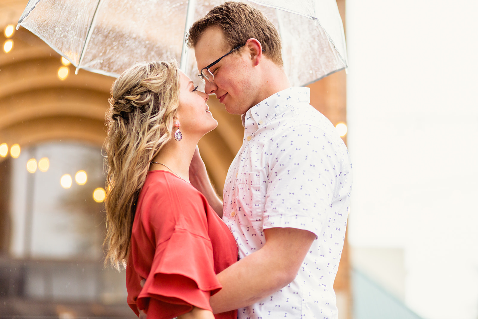 a rainy day engagement session held in downtown Lima Ohio