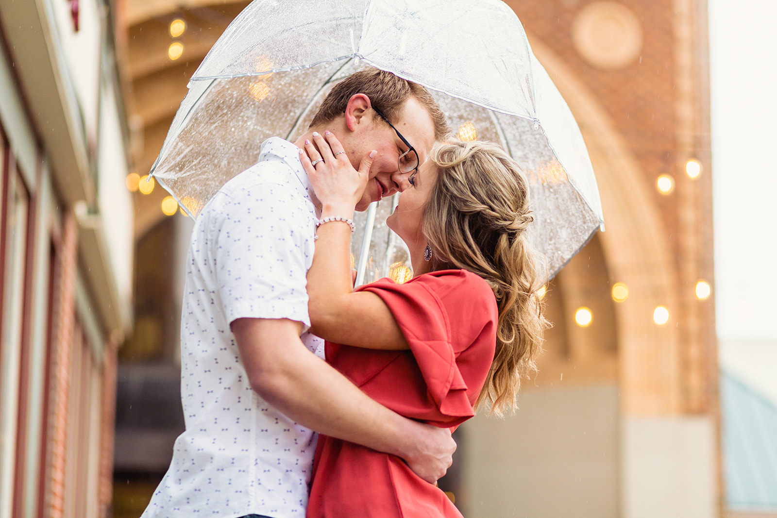 a rainy day engagement session held in downtown Lima Ohio