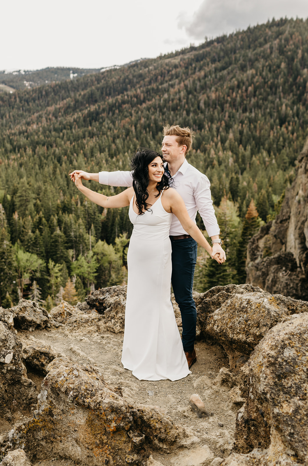 A couple on a mountain top in Lake Tahoe