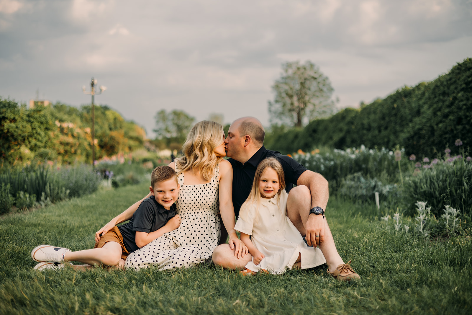 Happy family embraces nature in Ottawa Fields photoshoot