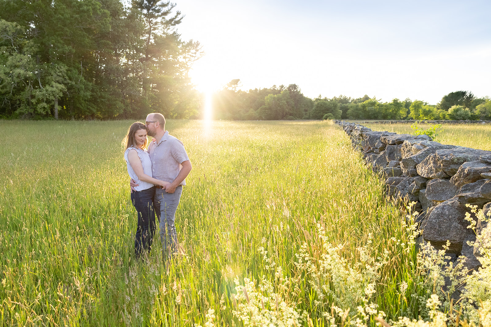 cape cod engagement couple in field