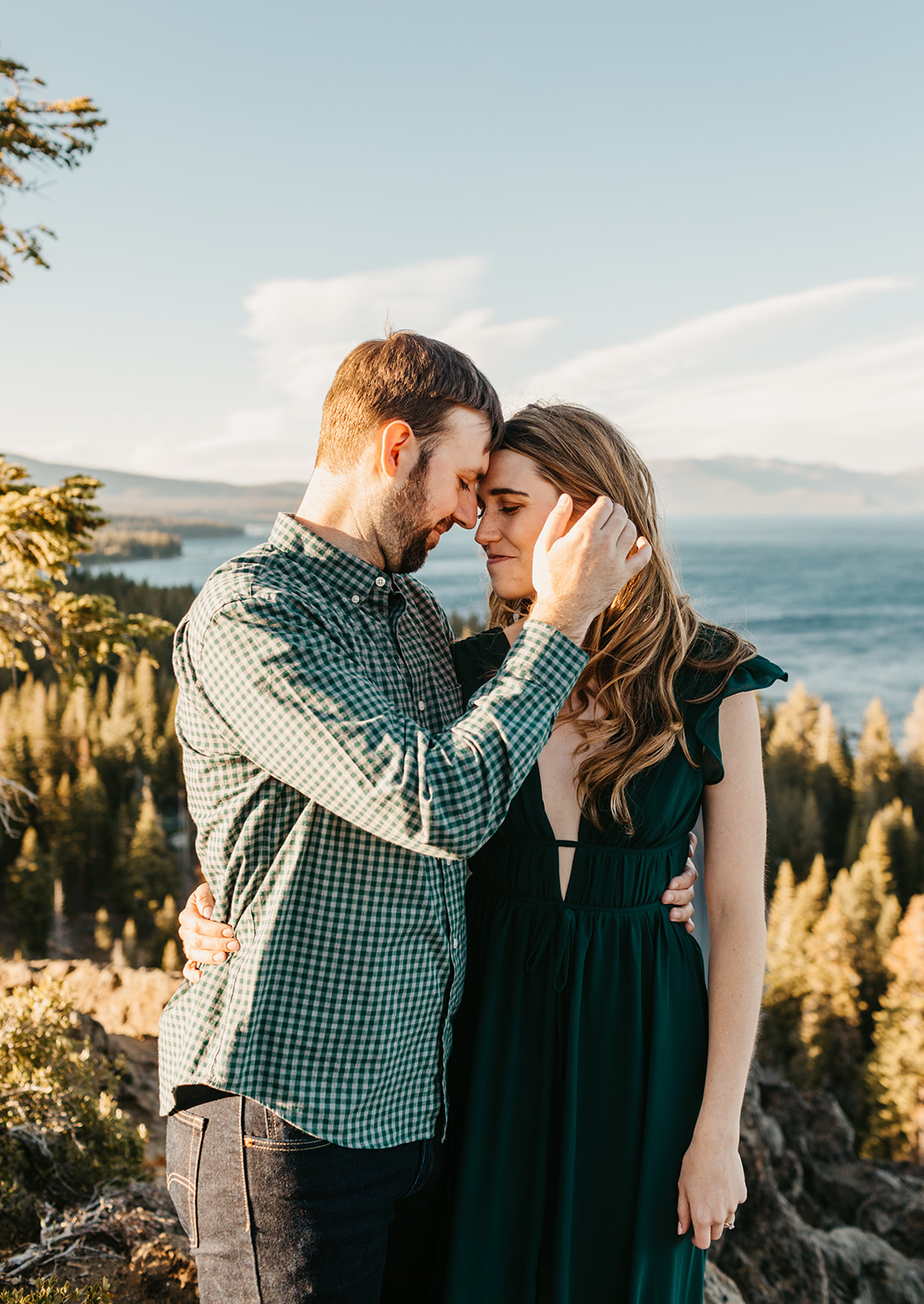A couple taking engagement photos in Lake Tahoe Califorina