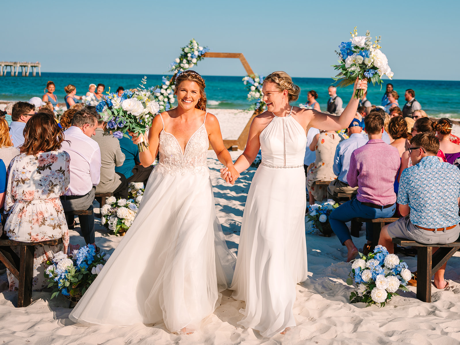 margaritaville pensacola florida lesbian beach wedding blue barefoot sparkler send off photographer