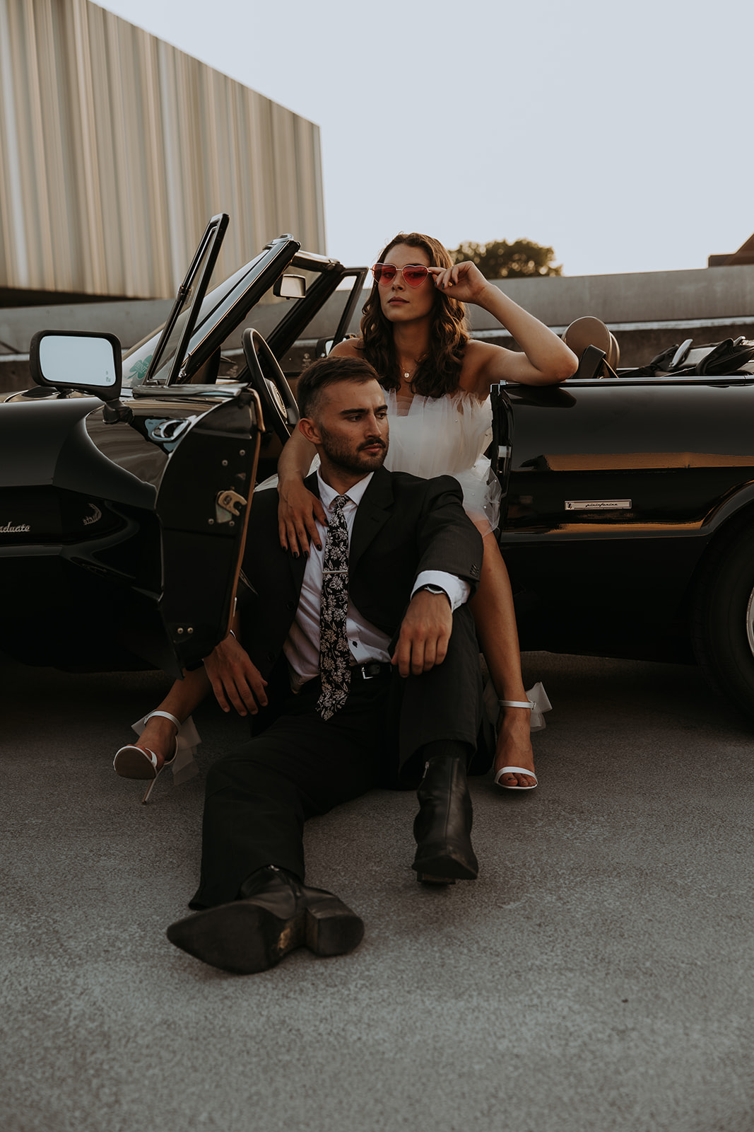 A parking garage rooftop engagement photo session