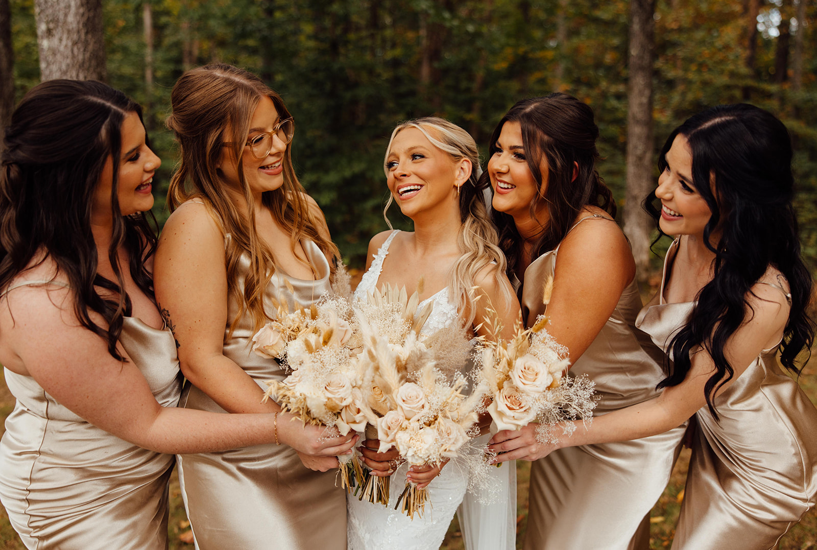 Satin gold bridemaid dresses, white wedding bouquet