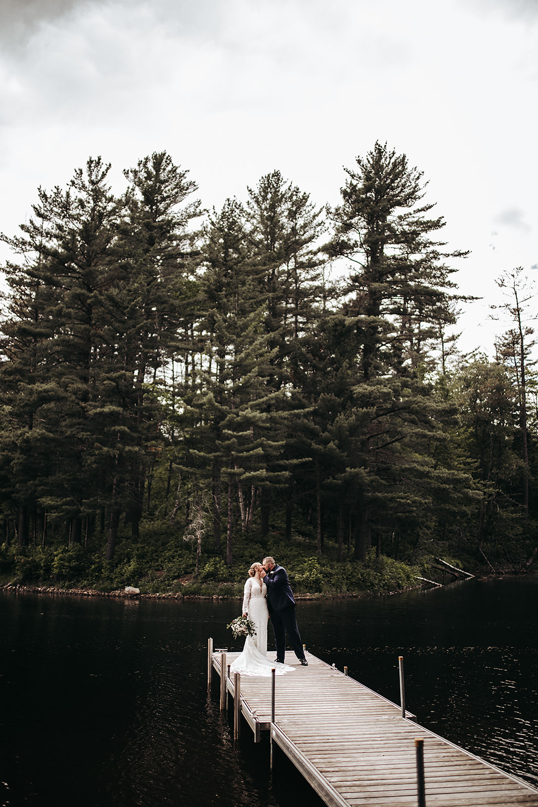 Marissa and Piero's stunning wedding at Maine Lakeside Cabins located in Caratunk, Maine. 