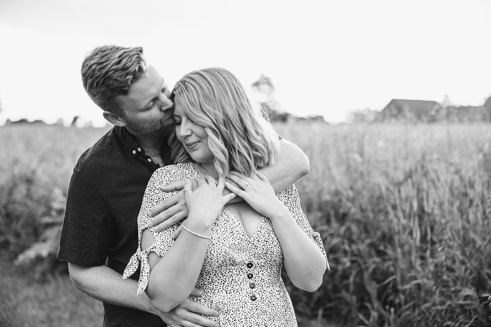 Candid and tender moments captured in the field during engagement shoot