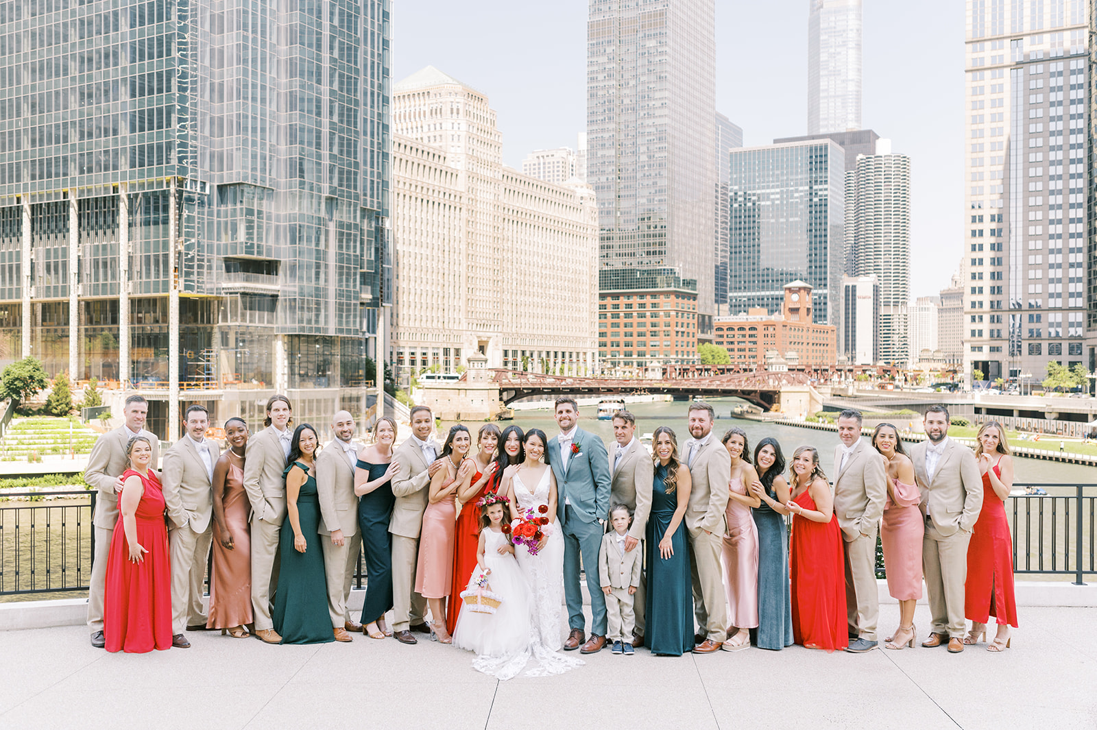 colorful bridal party lined up in front of chicago city scene