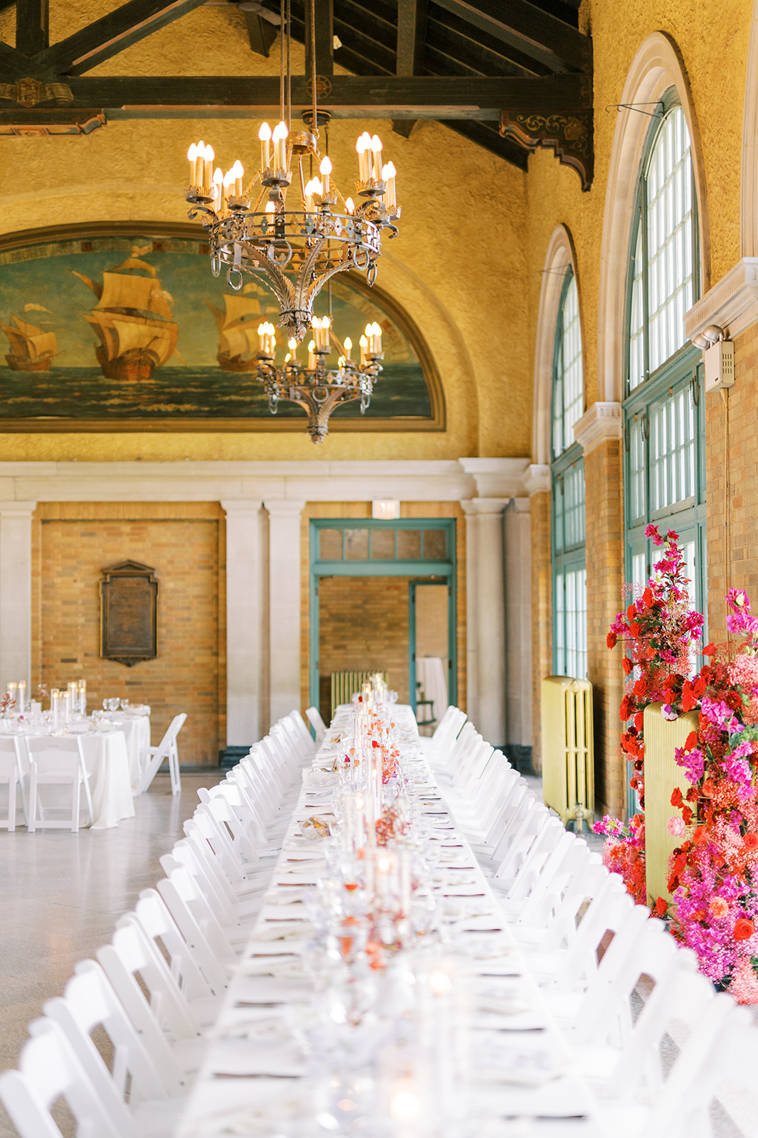 modern minimalistic wedding reception with pops of red at the Columbus Park Refectory